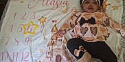 Alasia joined the competition — help win amazing prizes! baby, girl, infant, blanket, milestone, numbers, castle, stars, headband, bow, leopard_print, heart, dress, boots, fuzzy, hand, toy, pink, yellow, celebration