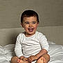 baby, barefoot, bed, child, cute, expression, face, hair, happy, indoors, infant, joy, onesie, portrait, sitting, skin, smiling, toddler, white_clothing, young_child