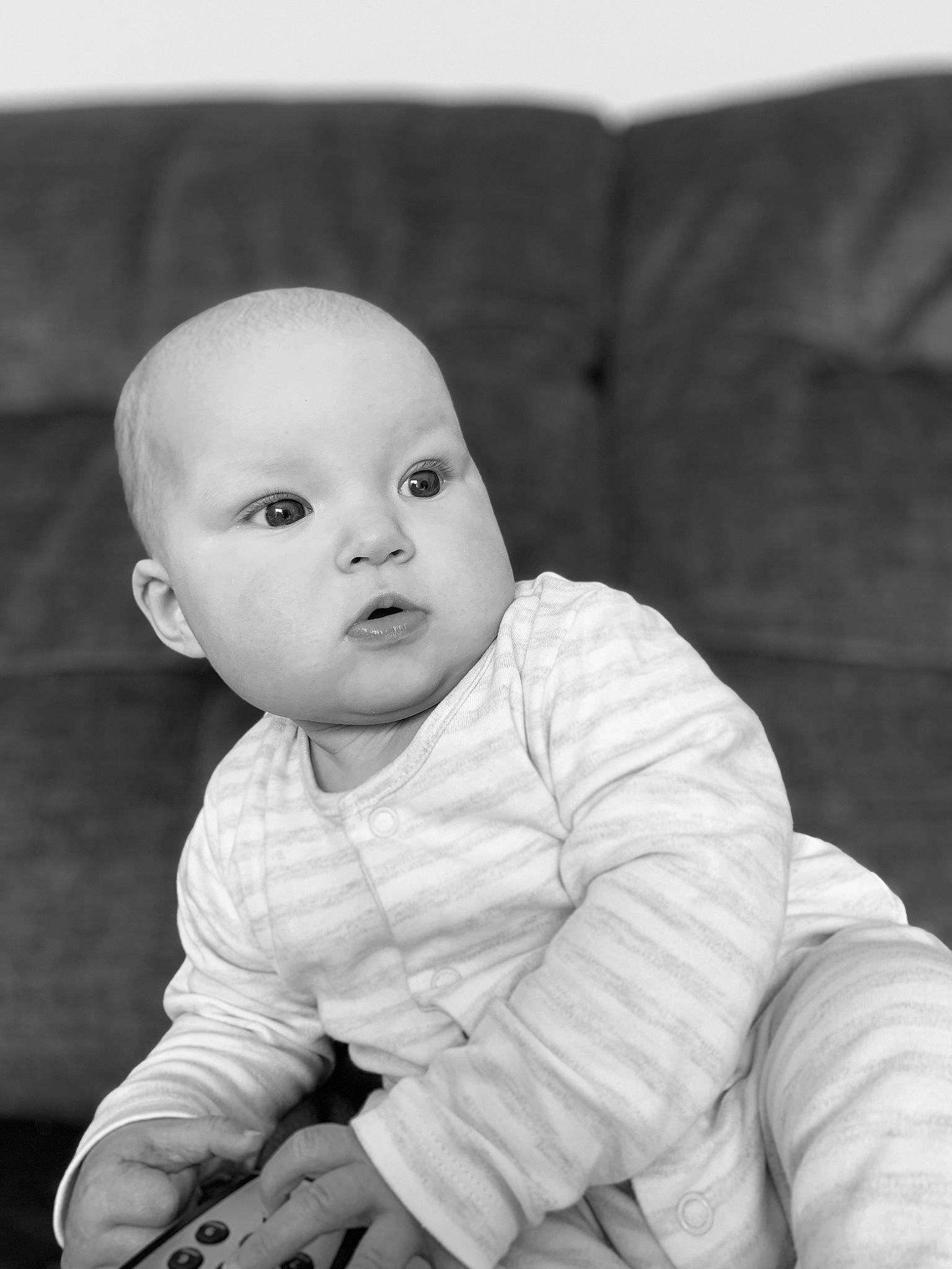 Lacie joined the competition — help win amazing prizes! baby, black, black_and_white, cheek, child, eye, face, head, lip, monochrome, monochrome_photography, people, person, photograph, photography, portrait, sitting, skin, smile, toddler