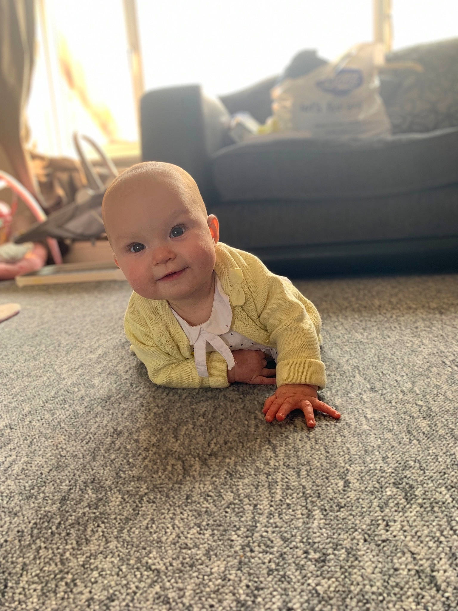 Lacie joined the competition — help win amazing prizes! baby, cheek, child, crawling, floor, flooring, hand, head, leg, person, photography, play, sitting, skin, sky, smile, snapshot, toddler, tummy_time, vacation