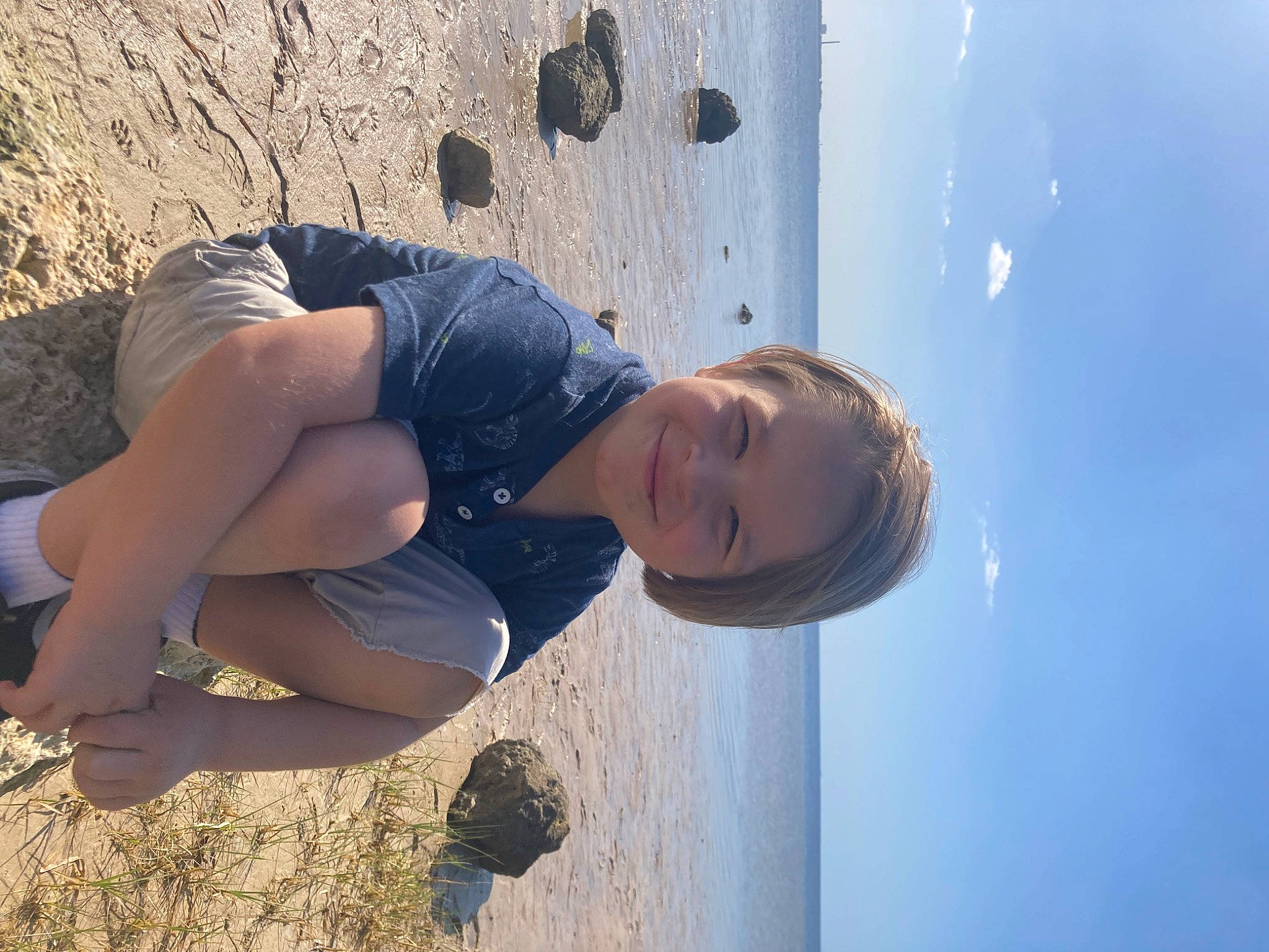 Jace is registered to the contest to win money with this photo: azure, beach, elbow, electric_blue, flash_photography, happy, human_body, human_leg, joy, landscape, leisure, people_in_nature, person, sand, sky, smile, standing, sunlight, thigh, travel