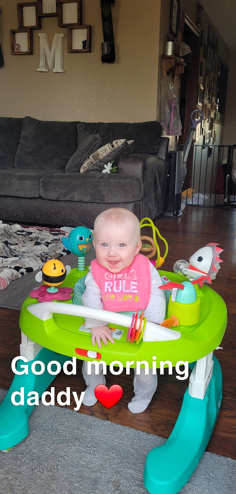 Iris joined the competition — help win amazing prizes! baby, baby_toddler_clothing, chair, child, comfort, couch, event, flooring, fun, green, happy, lap, mammal, people, person, pink, sitting, smile, toddler, toy