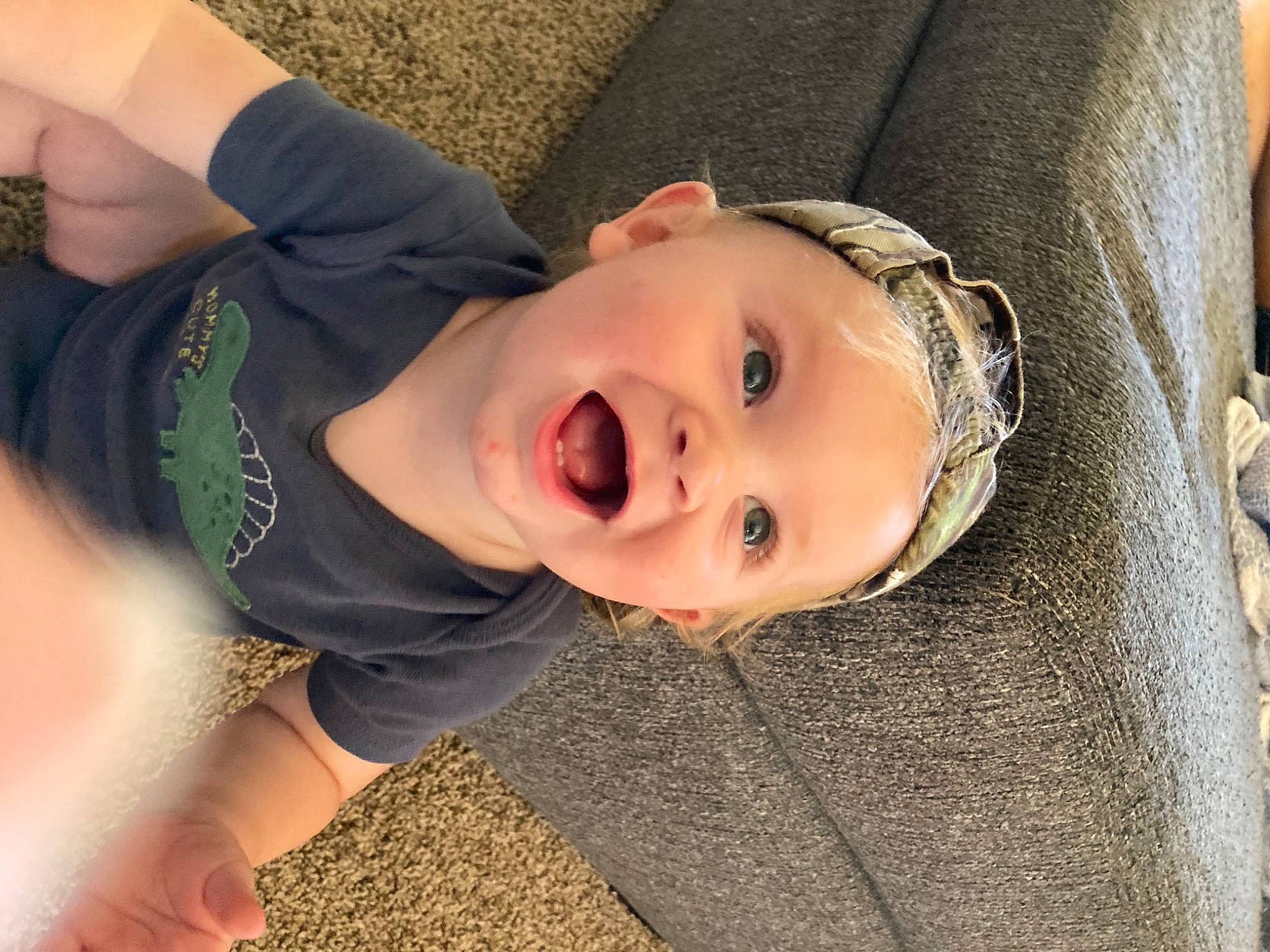 Eli joined the competition — help win amazing prizes! baby, baby_toddler_clothing, blond, cheek, chin, comfort, eye, eyebrow, fun, gesture, grass, happy, iris, lip, mouth, nose, person, skin, sleeve, smile