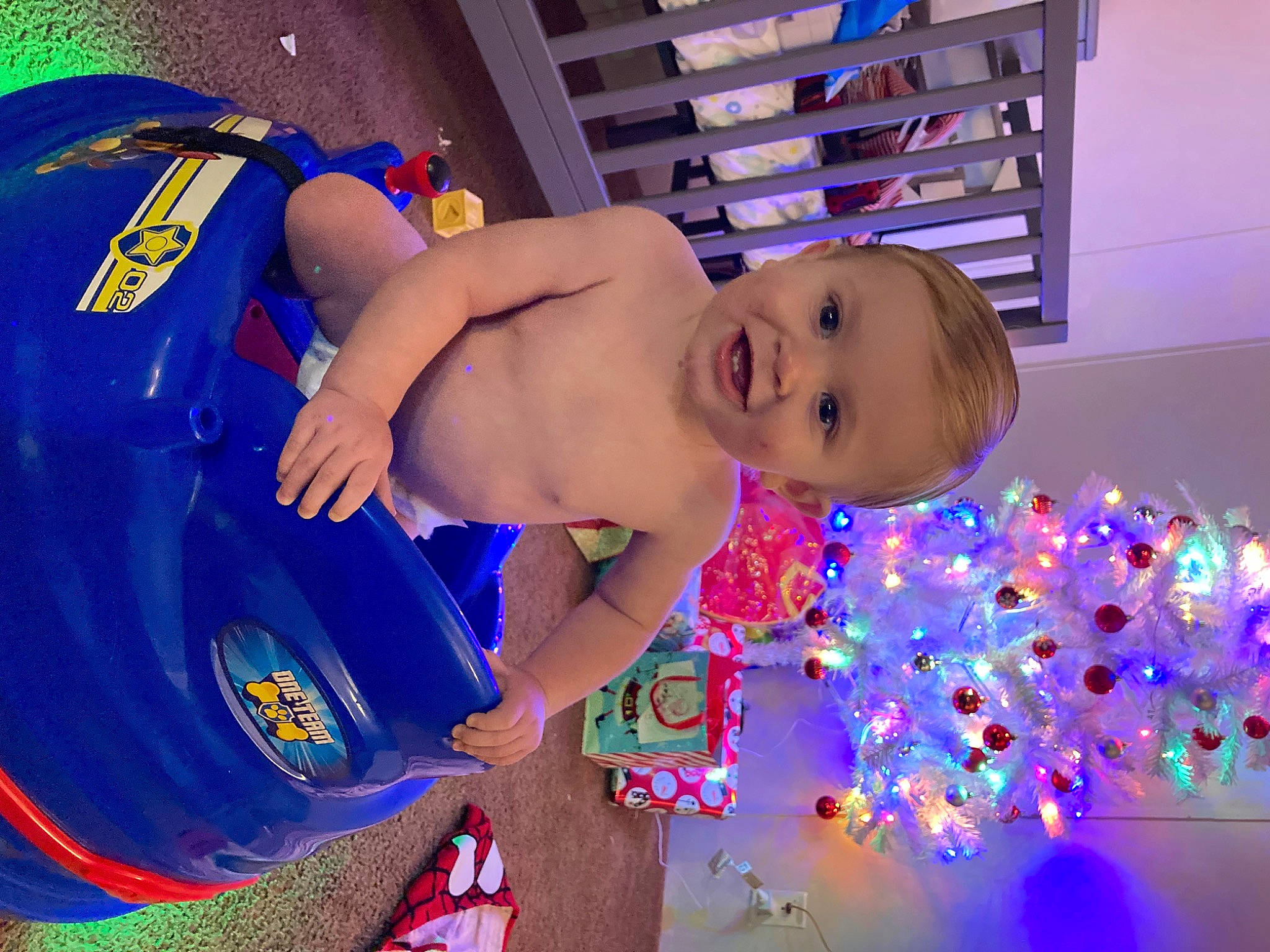 Eli joined the competition — help win amazing prizes! abdomen, baby, baby_products, barechested, blue, chest, child, electric_blue, event, fun, happy, joy, leisure, ornament, party_supply, person, play, smile, swimming_pool, swimwear