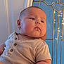 Sam joined the competition — help win amazing prizes! baby, child, infant, striped_shirt, arm, face, person, indoor, window, glass, decorative_window, blue, gold, skin, portrait, expression, holding, cute, young, chubby