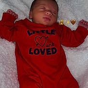 Kaiisaac joined the competition — help win amazing prizes! baby, sleeping, red_onesie, blanket, infant, cute, cozy, newborn, clothing, soft, peaceful, portrait, child, white_blanket, resting, adorable, small_hands, footwear, indoors, relaxation