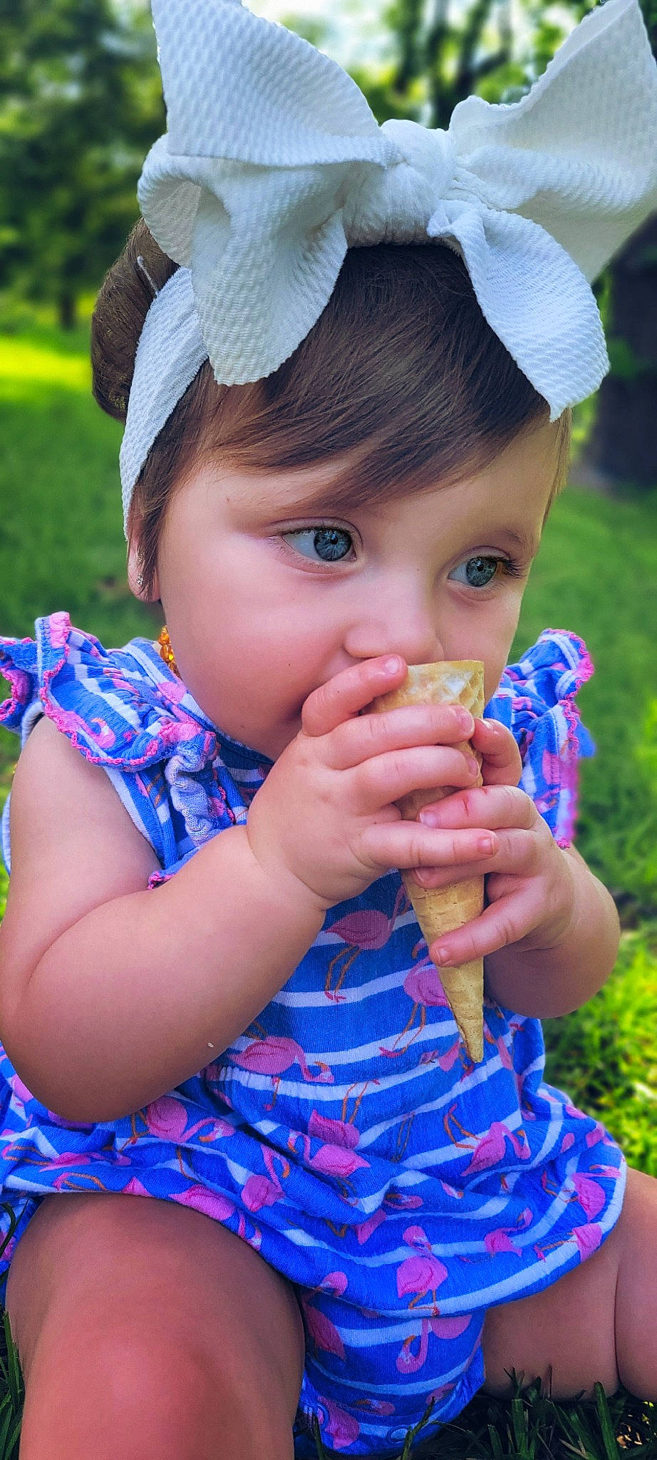 Bennett joined the competition — help win amazing prizes! baby_toddler_clothing, blue, cap, face, facial_expression, finger, grass, green, hand, happy, headwear, iris, leaf, lip, nose, organ, person, photograph, pink, plant