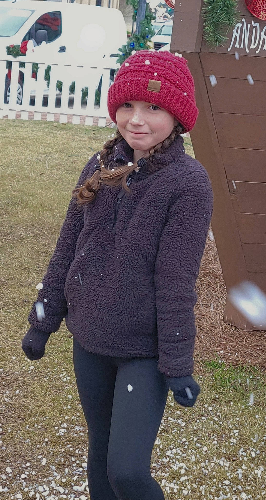 Mckinley is registered to the contest to win money with this photo: cap, clothing, electric_blue, face, freezing, grass, headgear, headwear, joy, knit_cap, magenta, outerwear, pattern, people, person, sleeve, smile, standing, textile, toddler