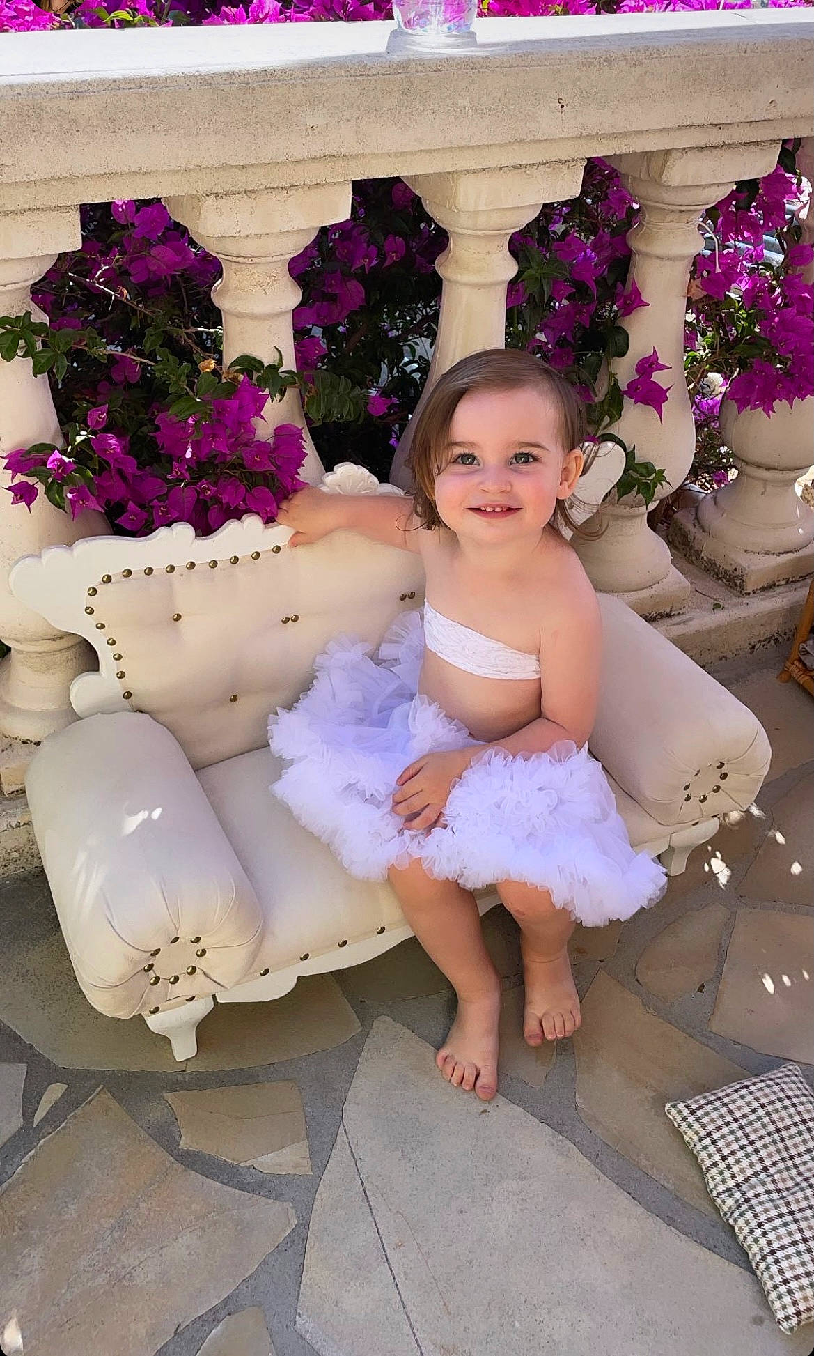 Lyse participe au concours pour gagner de l'argent avec cette photo : bridal_accessory, bridal_clothing, child, dress, eye, face, flash_photography, flower, gown, happy, head, headpiece, joy, person, petal, pink, plant, purple, smile, summer