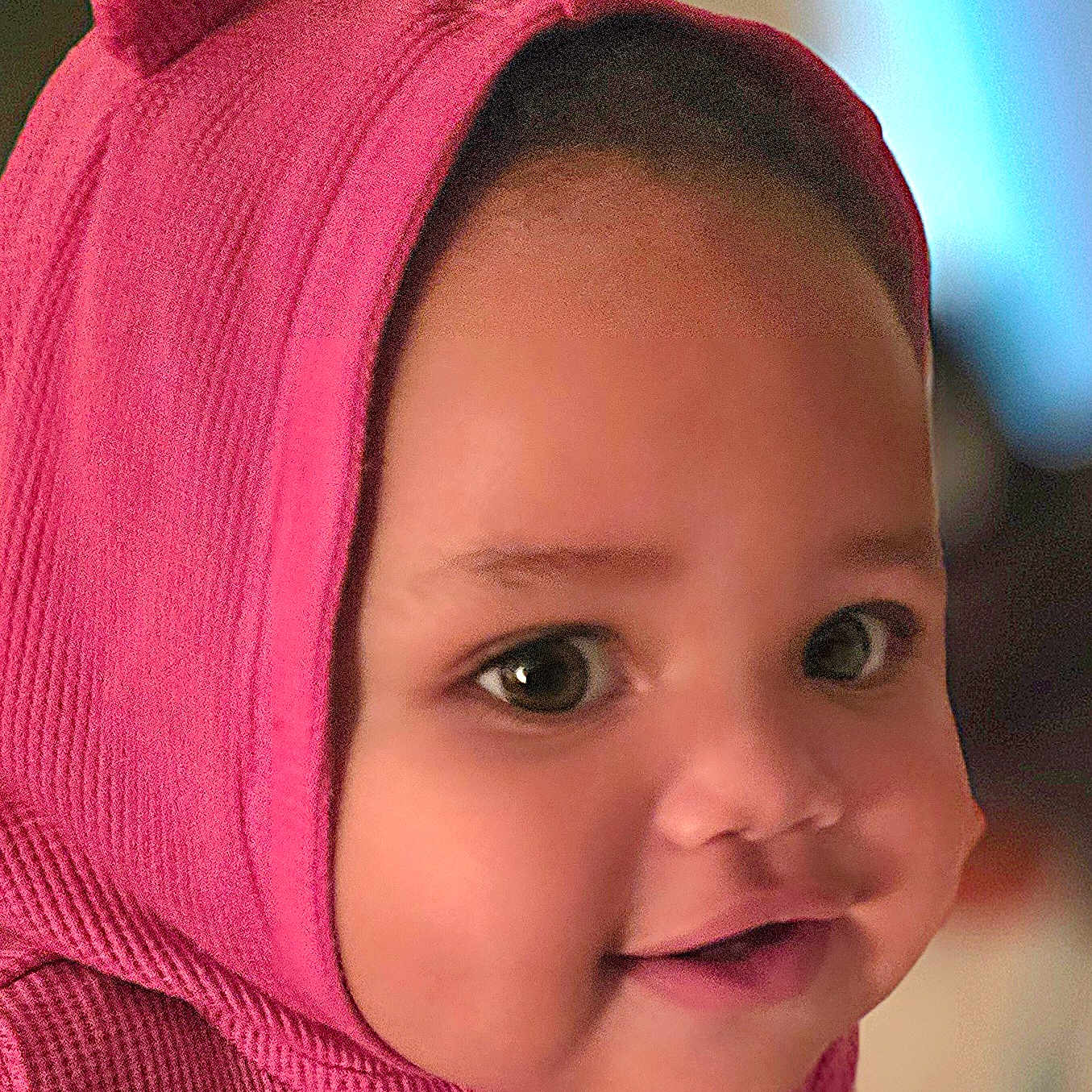 Lakelyn Skye joined the competition — help win amazing prizes! baby, child, infant, portrait, close_up, smiling, happy, face, eyes, hood, pink, clothing, bear_ears, indoor, soft_lighting, blurred_background, head, cheeks, cute, photography