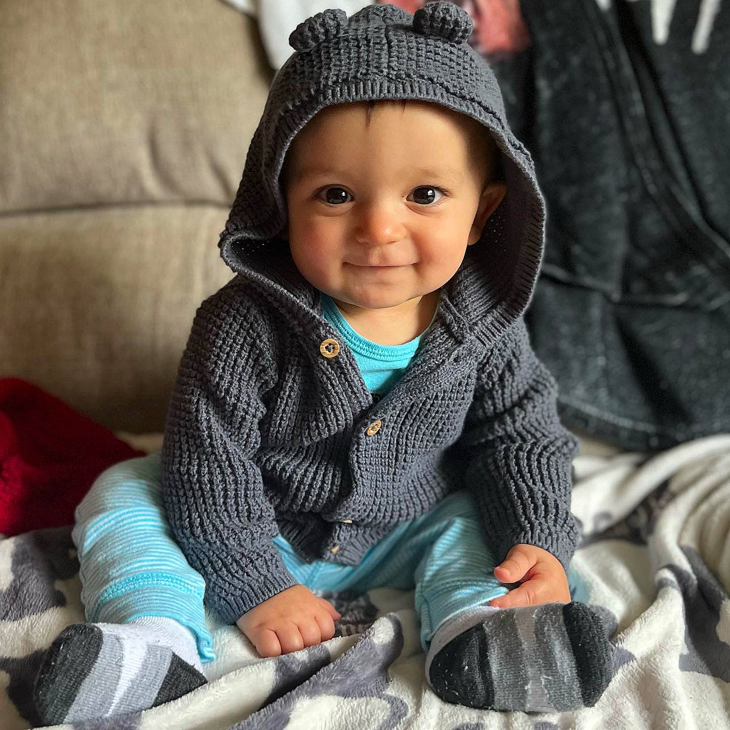 Myles is registered to the contest to win money with this photo: baby, baby_toddler_clothing, beauty, cap, cheek, comfort, cool, eye, happy, head, headgear, headwear, jacket, joy, organ, outerwear, person, skin, sleeve, smile