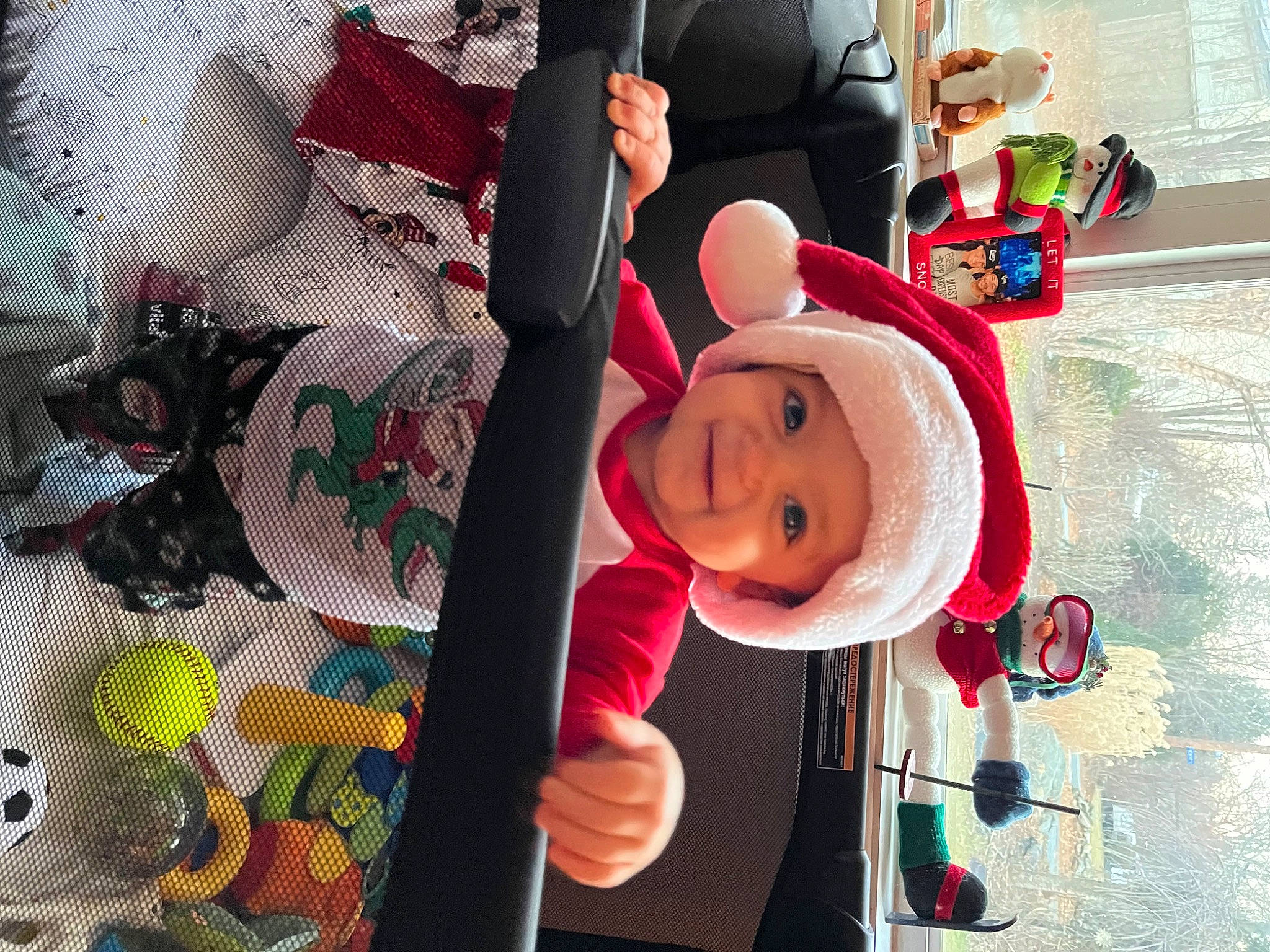 Myles is registered to the contest to win money with this photo: art, baby, baby_products, baby_toys, carmine, child, event, fun, happy, hat, headgear, headwear, pattern, person, pink, room, smile, stuffed_toy, textile, toddler