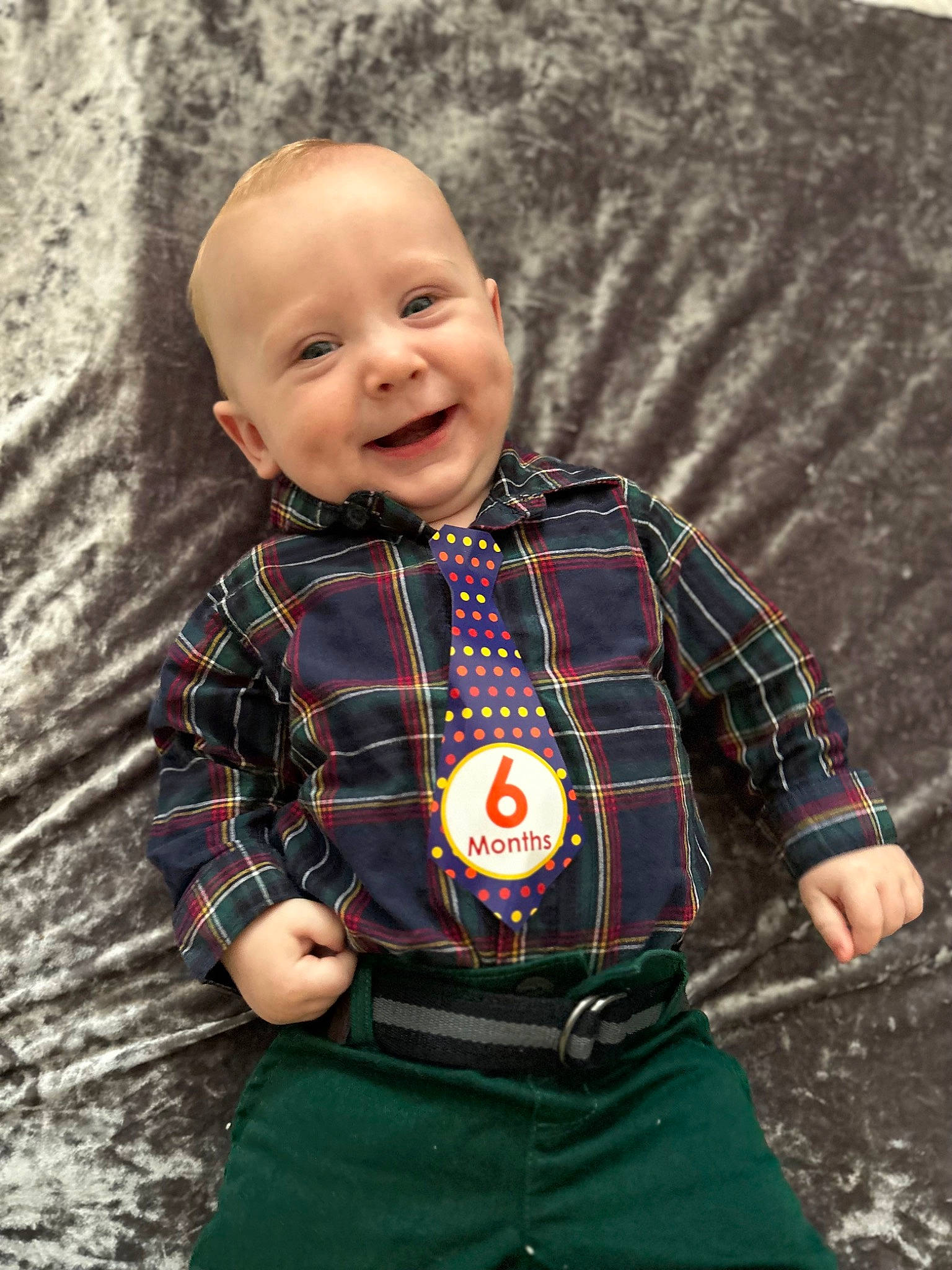 Isaiah is registered to the contest to win money with this photo: baby, baby_toddler_clothing, collar, cool, eye, face, fun, happy, joy, leaf, outerwear, pattern, person, plaid, skin, sleeve, smile, standing, t_shirt, tartan