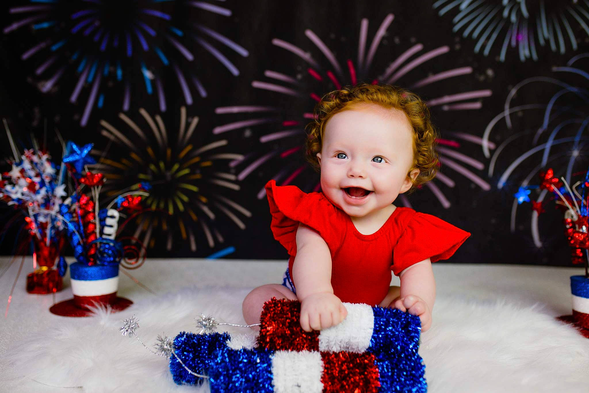 Braelee is registered to the contest to win money with this photo: baby, baby_playing_with_toys, baby_toddler_clothing, blue, child, electric_blue, event, face, fun, happy, joy, party, party_supply, person, pink, purple, red, sitting, smile, textile