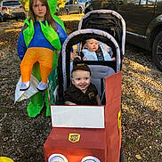 Joseph is registered to the contest to win money with this photo: accessories, architecture, baby, bag, building, car, face, female, girl, handbag, head, machine, outdoors, person, photography, portrait, spoke, teen, transportation, vehicle