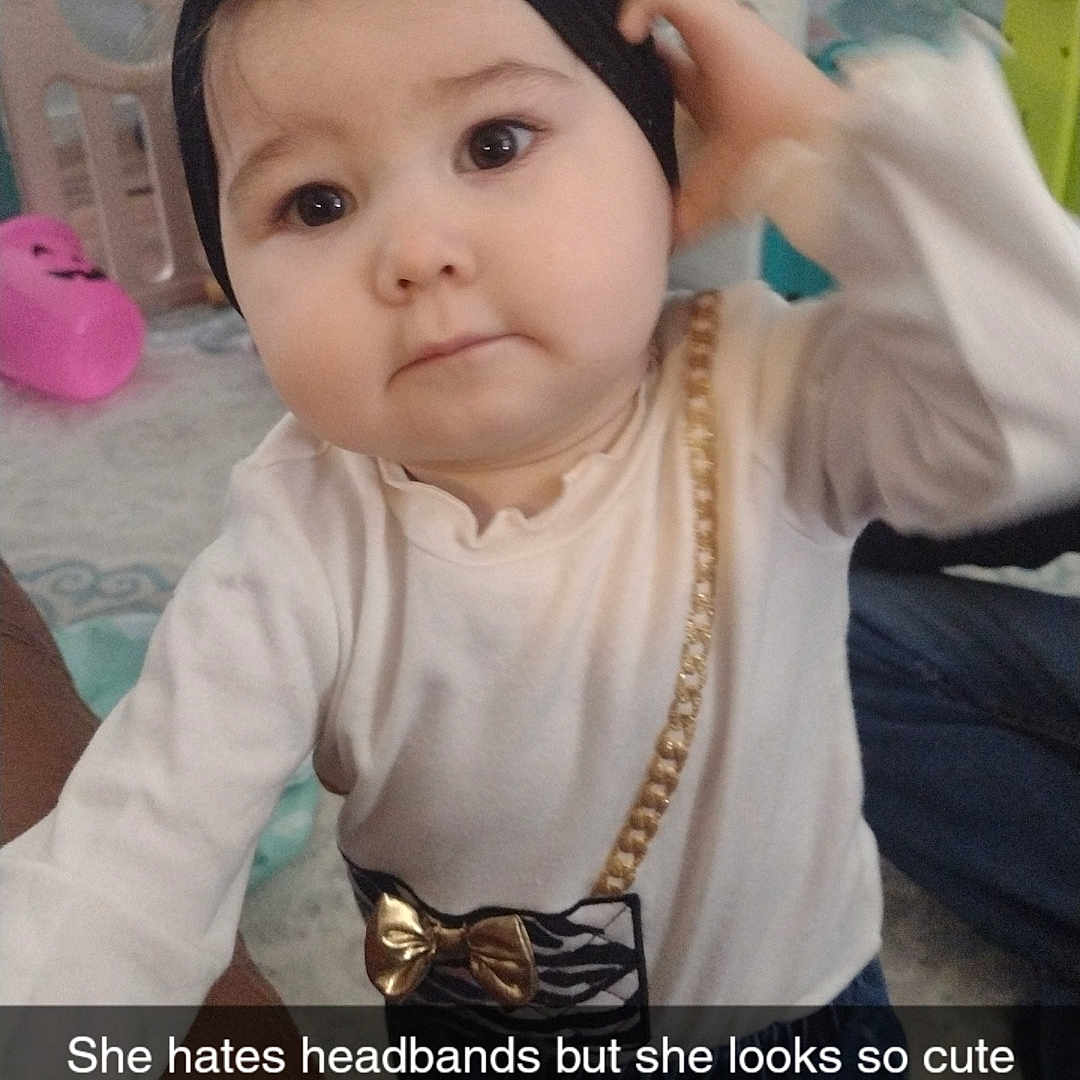 Viviana is registered to the contest to win money with this photo: accessories, baby, bag, clothing, costume, earring, face, furniture, handbag, hat, head, jeans, jewelry, necklace, pants, person, photography, portrait, strap, t_shirt