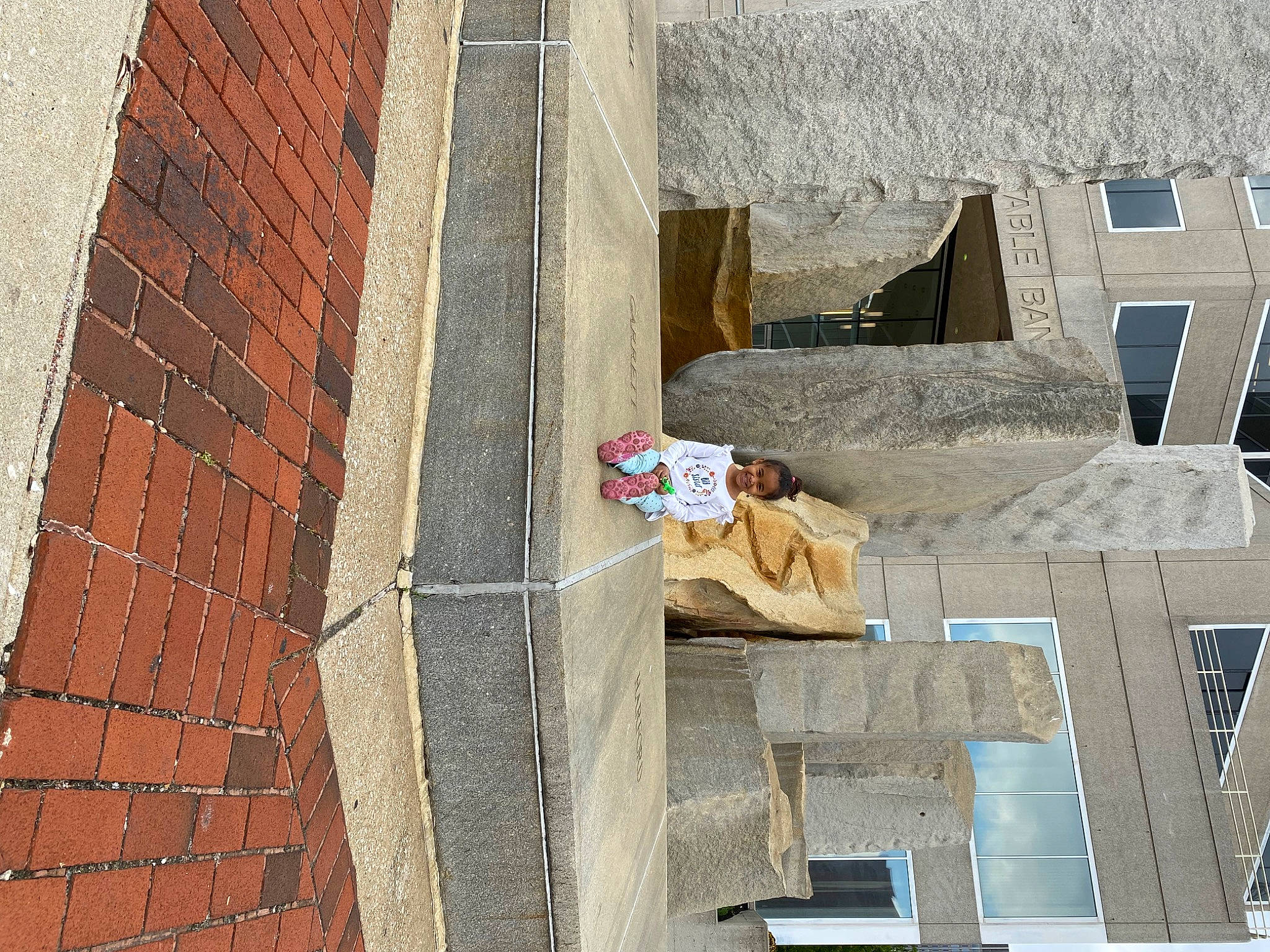 Aniya joined the competition — help win amazing prizes! brick, brickwork, chair, cobblestone, composite_material, concrete, facade, flooring, house, joy, landscape, outdoor_furniture, person, road_surface, shadow, sidewalk, sitting, stone_wall, street, urban_design