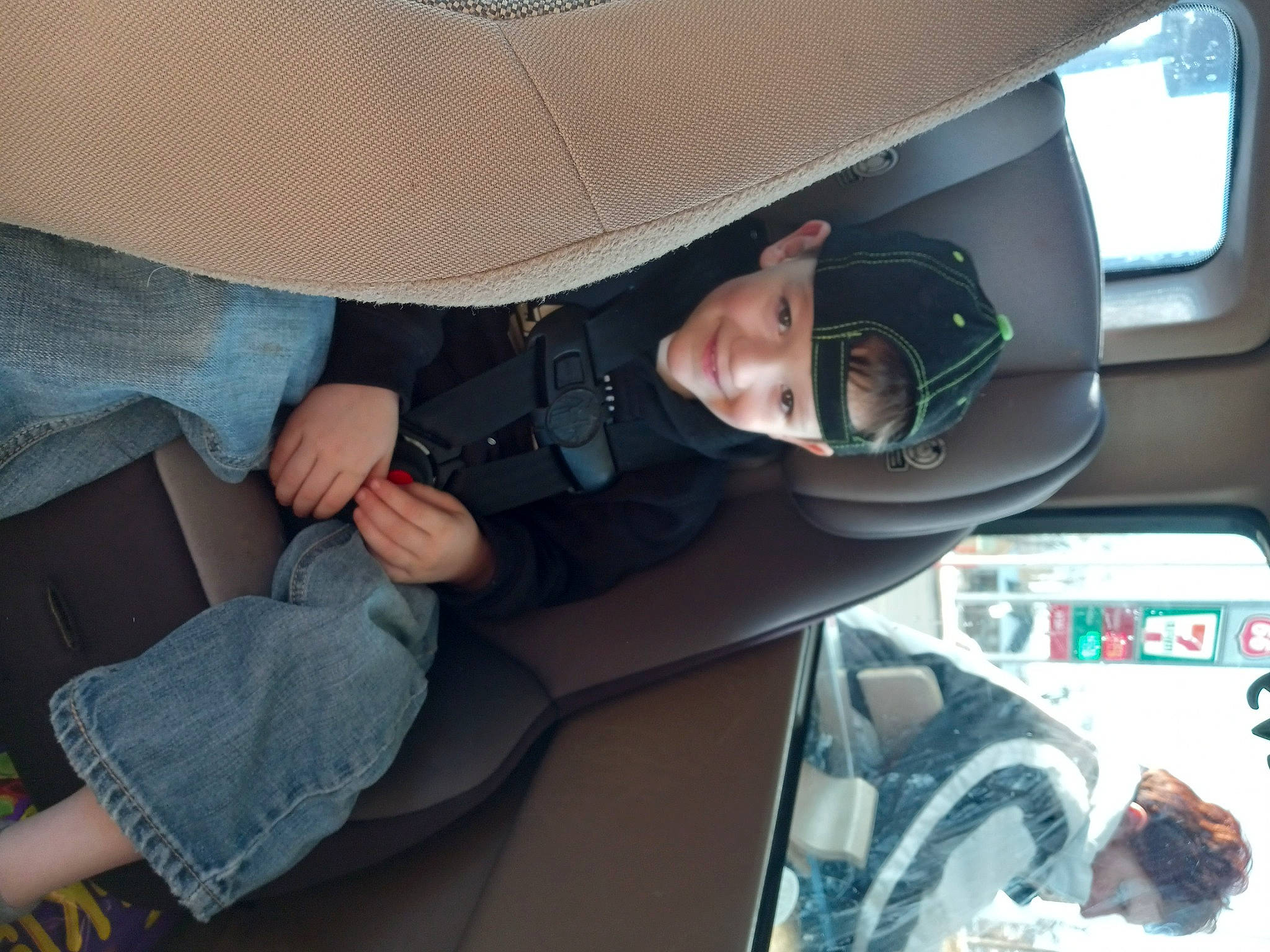 Kolt is registered to the contest to win money with this photo: auto_part, automotive_design, automotive_exterior, automotive_mirror, automotive_window_part, car, car_seat, car_seat_cover, comfort, eyewear, family_car, gesture, head_restraint, headwear, joy, luxury_vehicle, motor_vehicle, passenger, person, personal_luxury_car