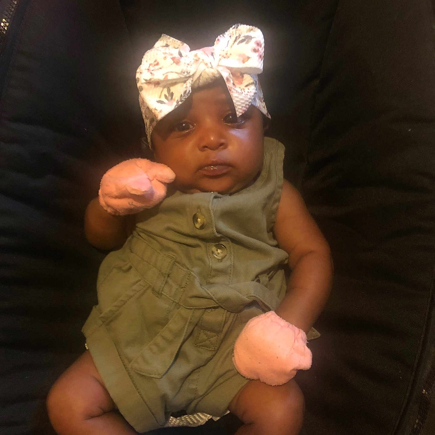 Jakiya joined the competition — help win amazing prizes! adorable, baby, baby_girl, black_seat, child, clothing, cute, fashion, green_outfit, headband, indoor, infant, mittens, person, portrait, seated, small, soft_lighting, white_socks, young