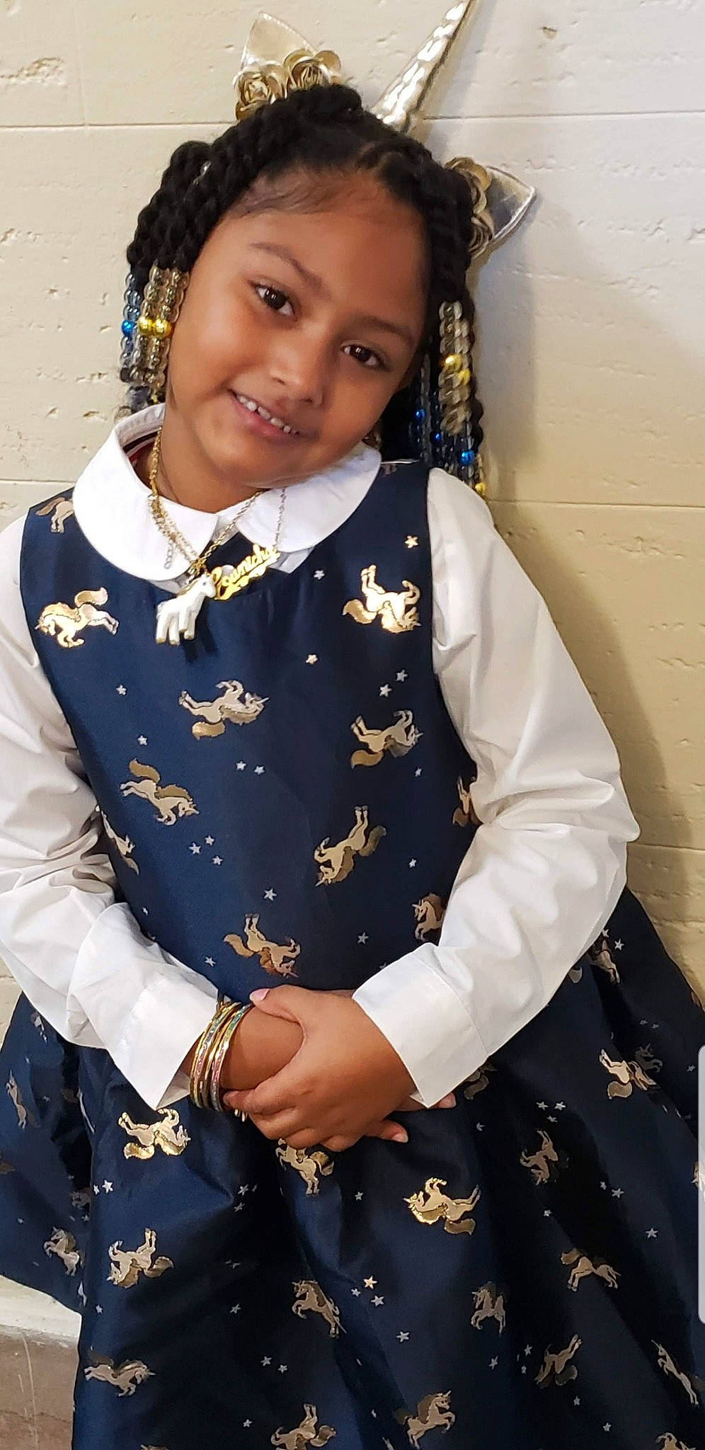 Eunicha Defreitas is registered to the contest to win money with this photo: black_hair, formal_wear, joy, long_hair, person, smile