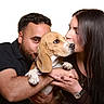 man, woman, dog, beagle, pet, love, affection, portrait, studio, white_background, smile, embrace, kiss, watch, long_hair, black_shirt, casual, happy, hands, closeup