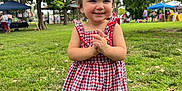 Ravynn joined the competition — help win amazing prizes! toddler, child, smile, dress, pigtails, grass, park, outdoor, people, trees, sunlight, happy, footwear, summer, nature, playful, event, greenery, young_child, daylight