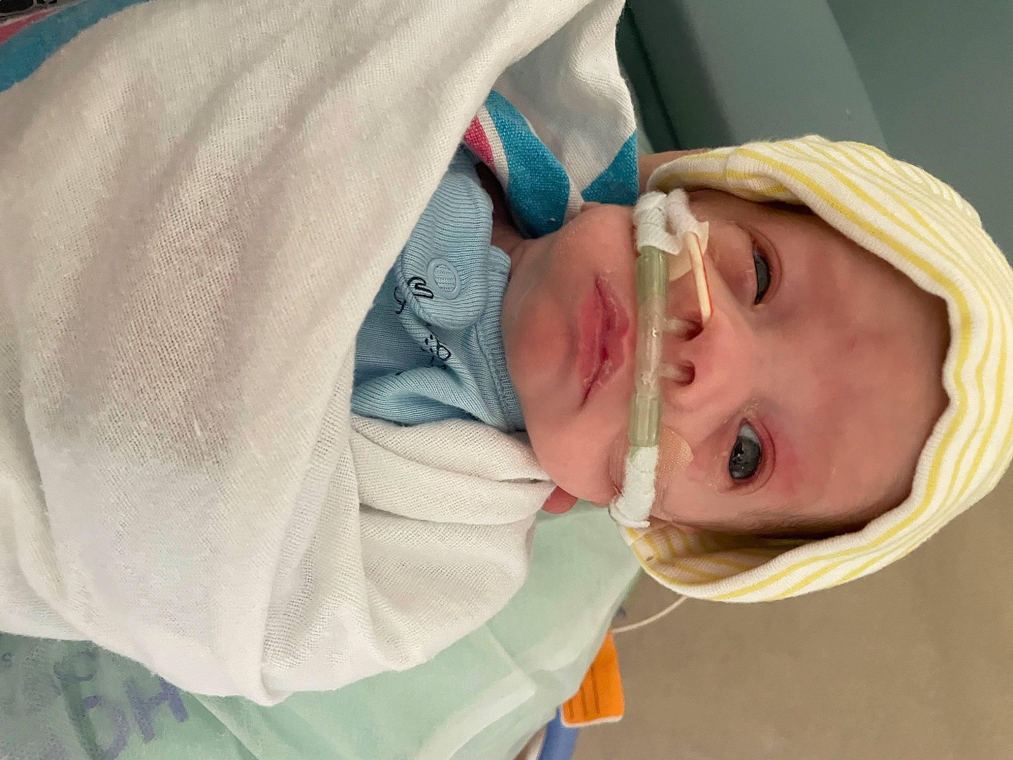 Kai is registered to the contest to win money with this photo: baby, baby_products, baby_toddler_clothing, cheek, child, comfort, eyelash, eyewear, fashion_accessory, happy, hat, linens, outerwear, person, sleeve, sunglasses, textile, toddler, window