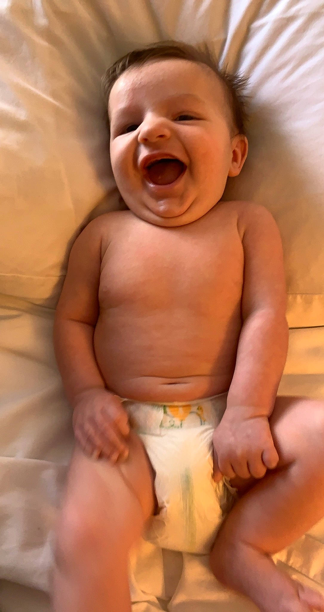 Rhett is registered to the contest to win money with this photo: abdomen, baby, baby_making_funny_faces, cheek, child, face, facial_expression, laugh, mouth, muscle, nose, person, skin, smile, stomach, toddler