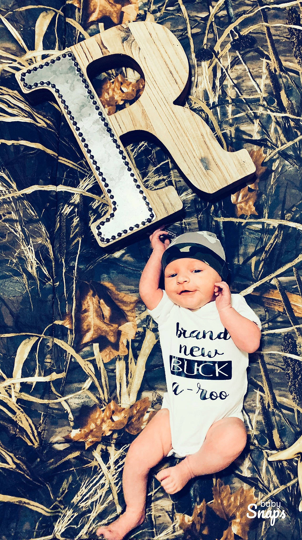 Rhett is registered to the contest to win money with this photo: branch, child, child_model, cool, headgear, headwear, illustration, person, photo_shoot, photography, plant, smile, style, t_shirt, toddler, tree, wood, yellow