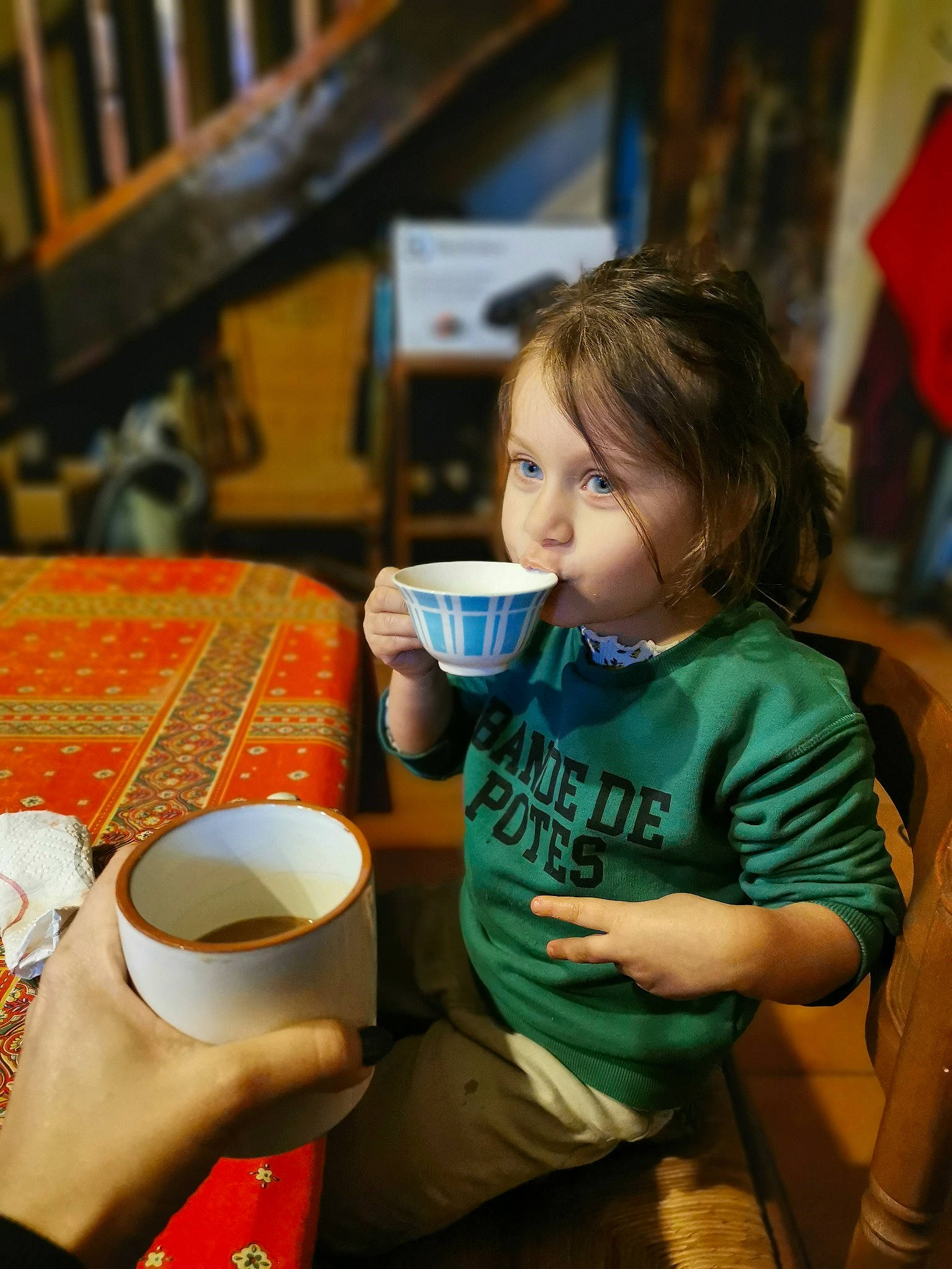 Dakota participe au concours pour gagner de l'argent avec cette photo : chair, coffee_cup, cup, dishware, drink, drinkware, happy, leisure, mug, person, photograph, plate, porcelain, serveware, snapshot, table, tableware, tea, teacup, toddler
