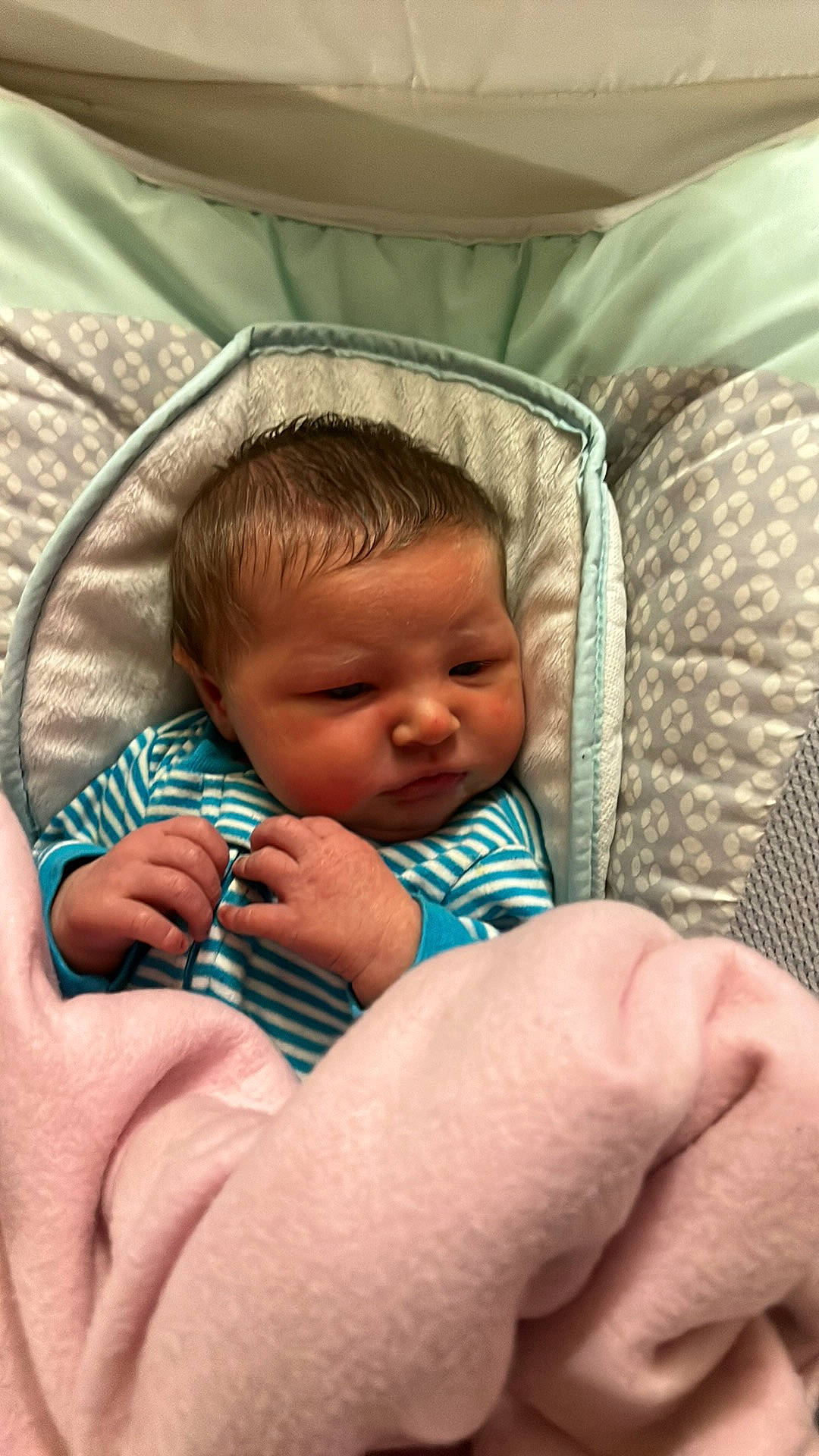 Jaxton is registered to the contest to win money with this photo: baby, baby_toddler_clothing, cheek, child, comfort, eye, face, facial_expression, finger, hair, hand, head, human, iris, lip, mouth, nose, person, skin, thumb