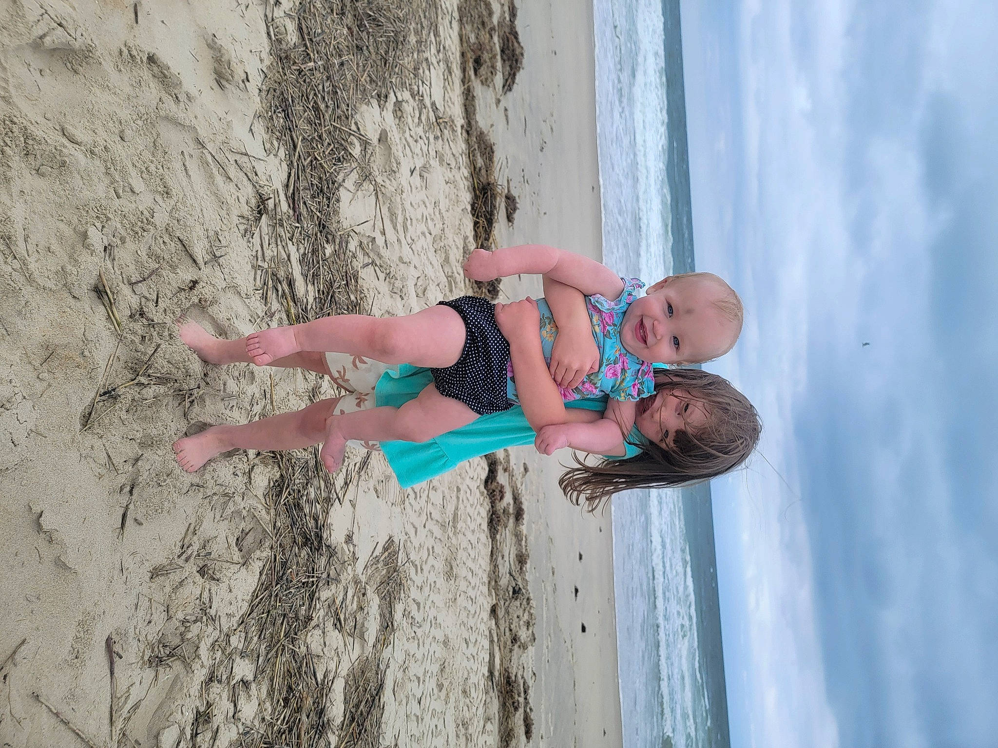 Jalynn joined the competition — help win amazing prizes! azure, beach, blue, cloud, electric_blue, fun, hair, happy, head, joy, leisure, people_on_beach, person, recreation, sky, smile, thigh, toddler, water, wind_wave