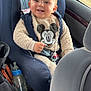 baby, blue, bottle, car_interior, car_seat, child, clothing, cute, happy, infant, mickey_mouse, person, portrait, seat, seatbelt, smiling, sweater, toy, travel, window