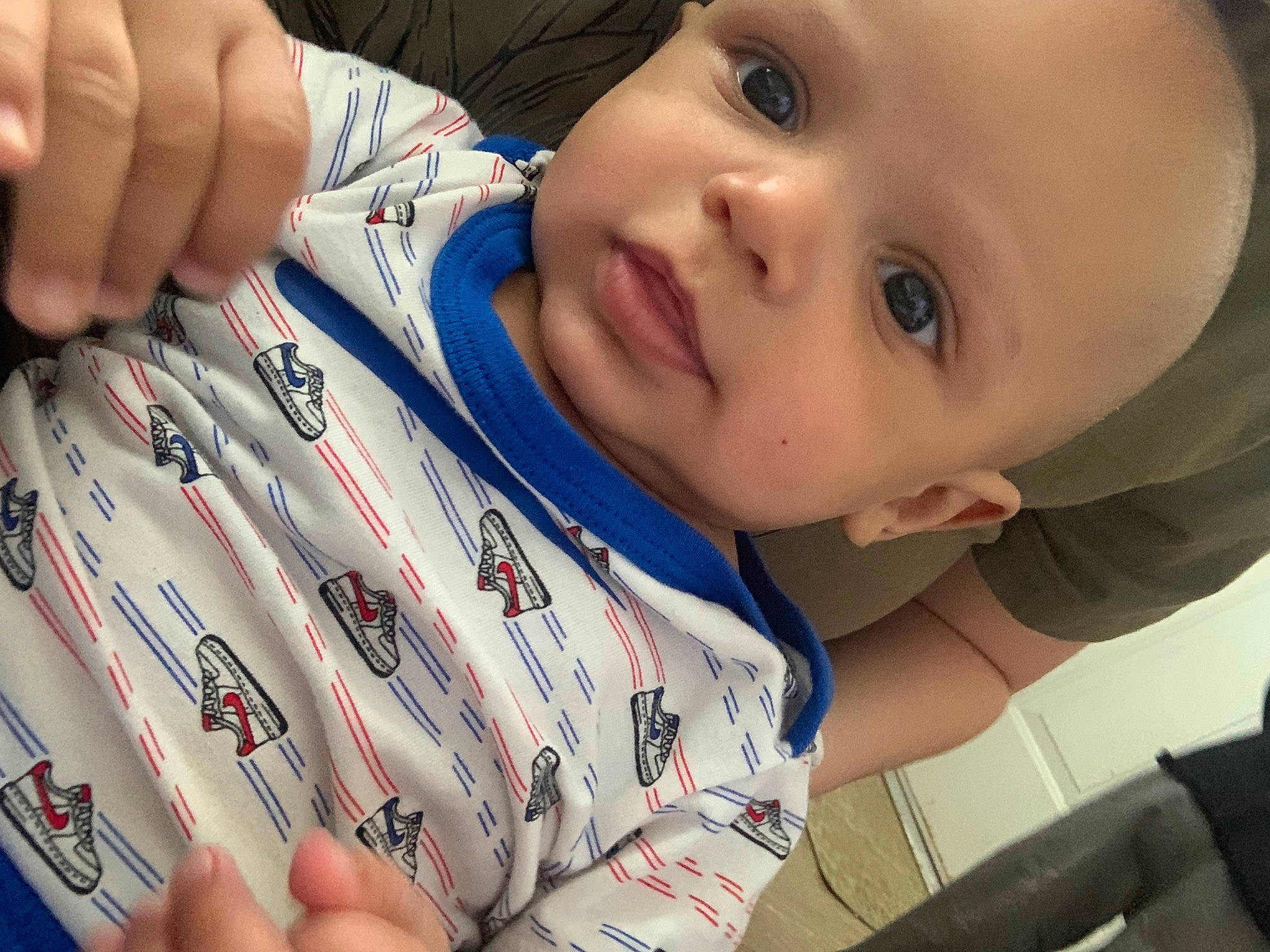 Zavian is registered to the contest to win money with this photo: arm, cheek, chin, clothing, eye, eyebrow, eyelash, facial_expression, forehead, hairstyle, hand, human_body, lip, mouth, neck, nose, organ, person, product, skin