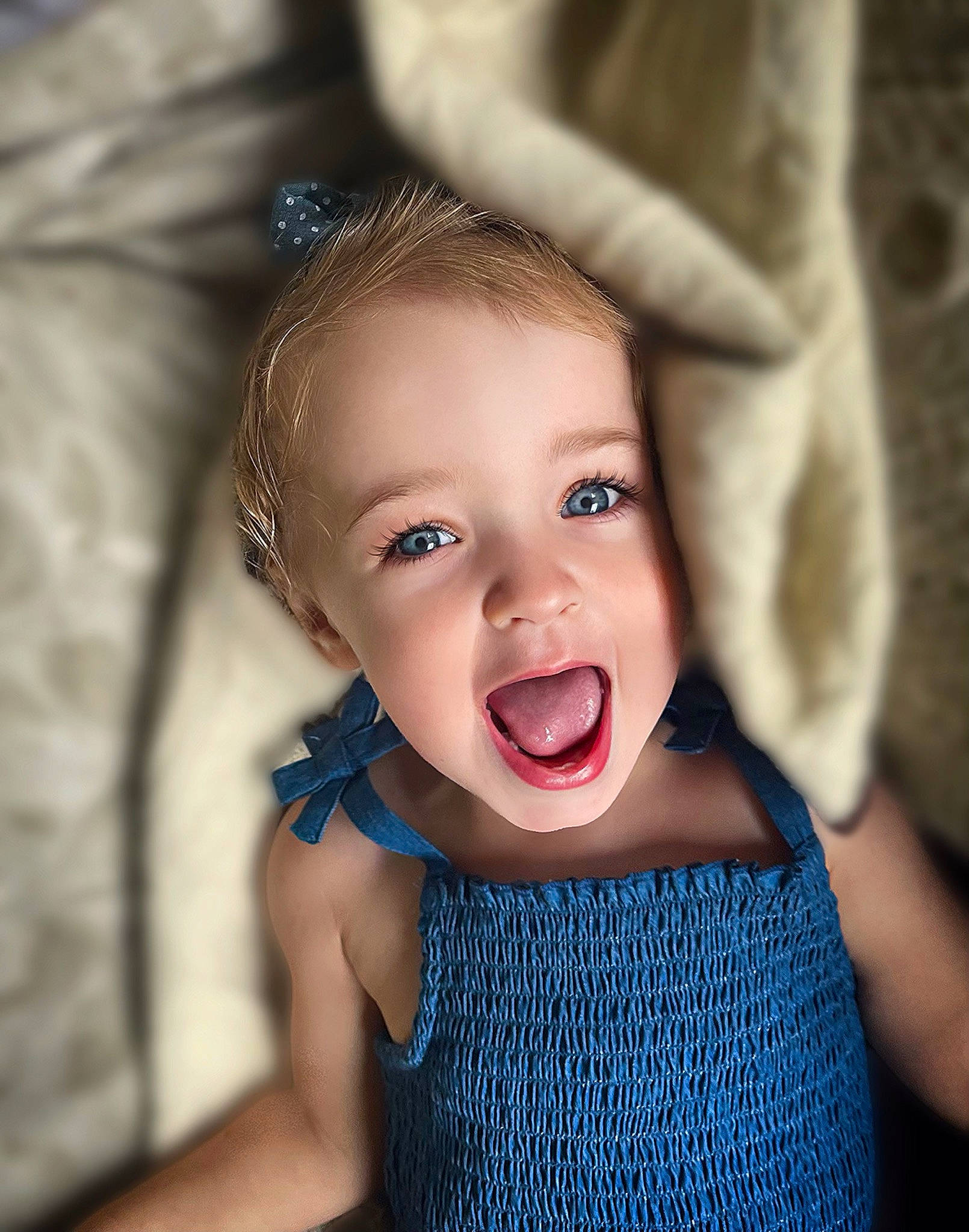 Haisley is registered to the contest to win money with this photo: baby, baby_toddler_clothing, brown_hair, cheek, child, electric_blue, eyelash, fashion_accessory, flash_photography, fun, gesture, happy, iris, lip, neck, pattern, person, skin, sleeve, smile