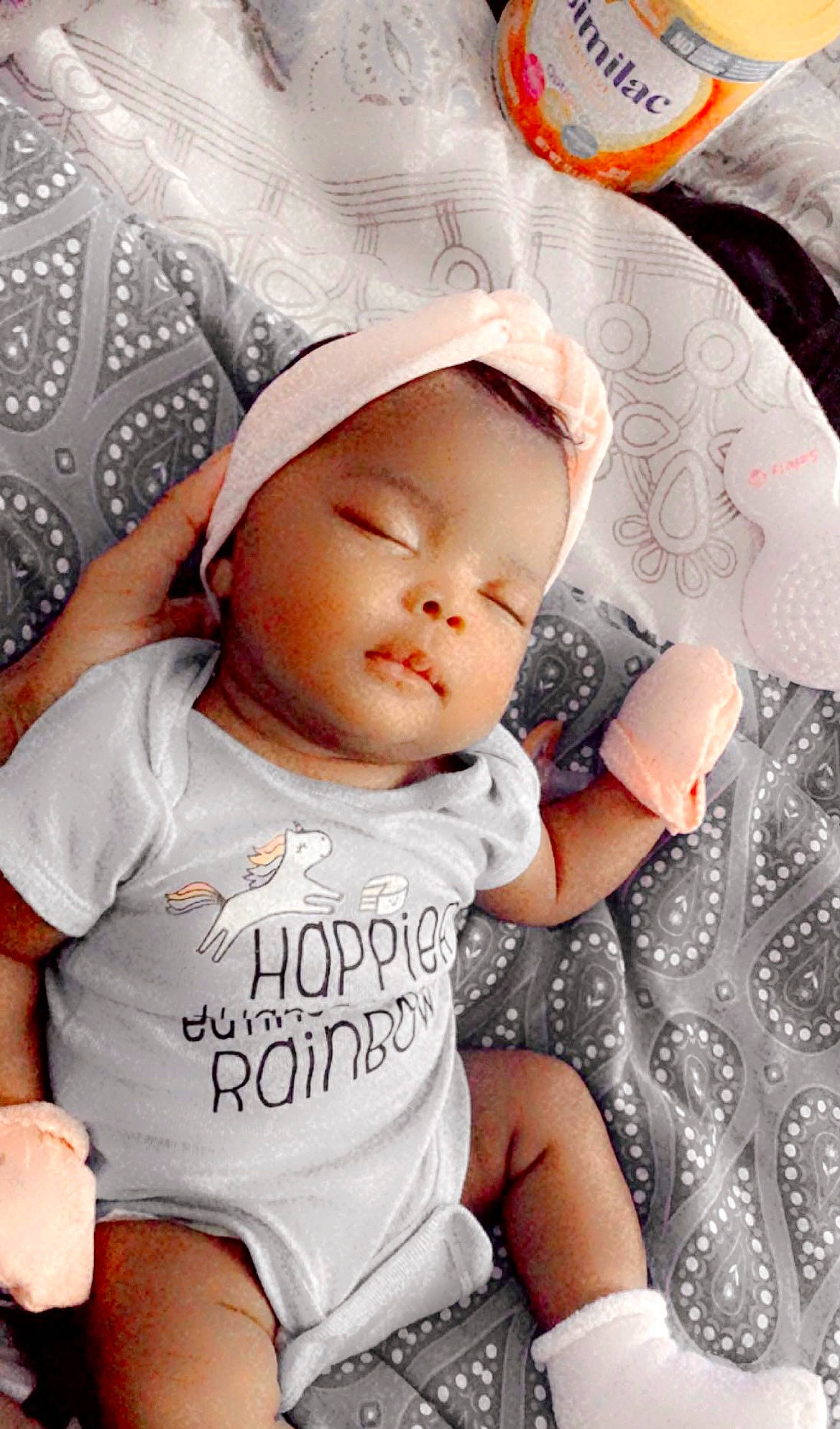 Alaiya joined the competition — help win amazing prizes! baby, baby_toddler_clothing, cap, cheek, child, comfort, cool, finger, happy, lip, mouth, pattern, person, photograph, pink, product, skin, sleeve, textile, toddler