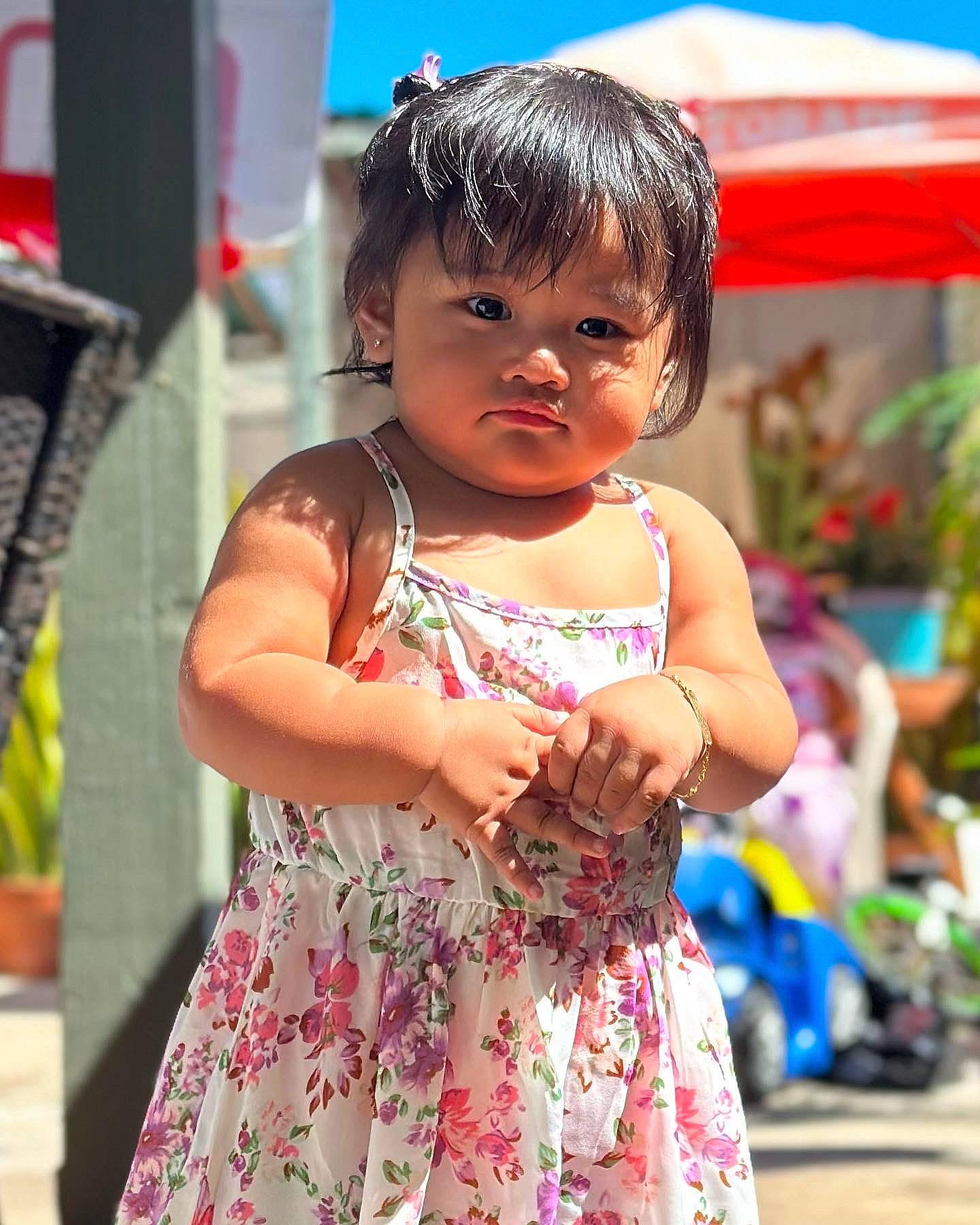 Sky is registered to the contest to win money with this photo: adaptation, child, day_dress, dress, event, facial_expression, fun, hairstyle, happy, human, jewellery, leisure, magenta, person, pink, recreation, skin, street, temple, toddler