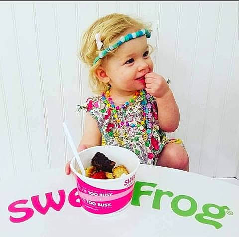Madeline is registered to the contest to win money with this photo: baby, baby_toddler_clothing, child, cuisine, dairy, dessert, dish, fashion_accessory, food, frozen_dessert, gelato, happy, headwear, ice_cream, ingredient, pattern, person, pink, sleeve, smile