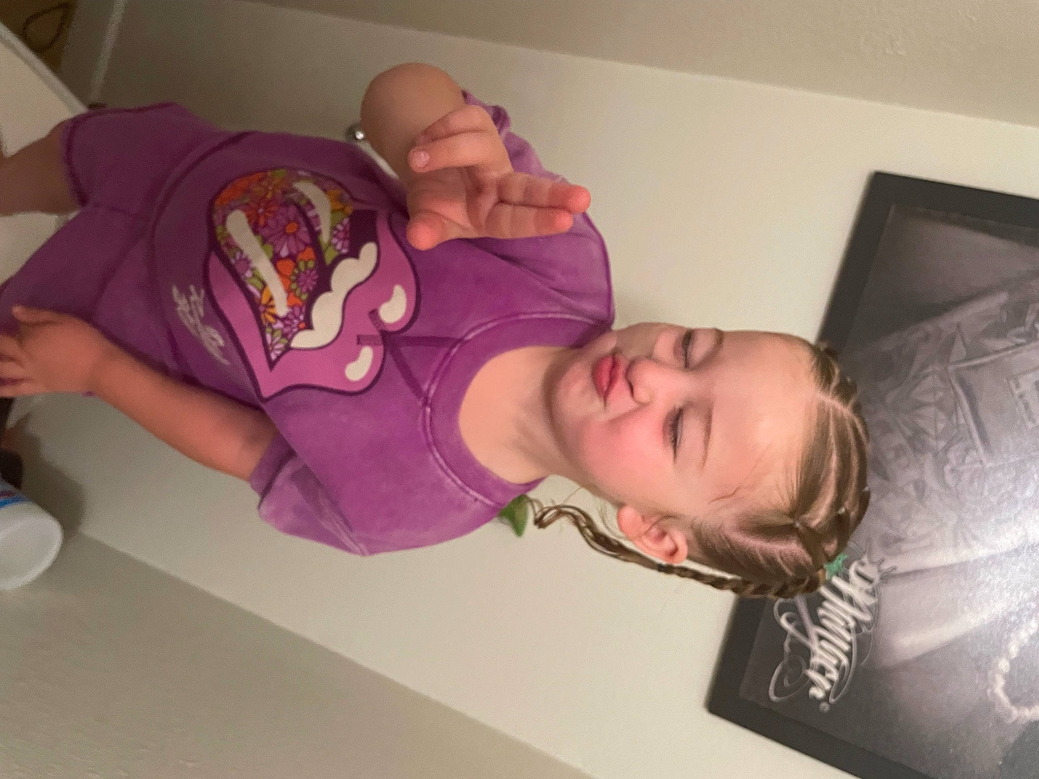 Kayleigh is registered to the contest to win money with this photo: abdomen, baby, chest, child, comfort, couch, facial_expression, food, fun, happy, homemaker, mouth, person, room, smile, t_shirt, tableware, thigh, toddler, tree