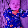Asher joined the competition — help win amazing prizes! baby, smiling, sleeping, onesie, colorful_clothing, blanket, soft_texture, infant, face, child, purple_light, cozy, cute, young, portrait, lying_down, indoors, peaceful, happy, sleep