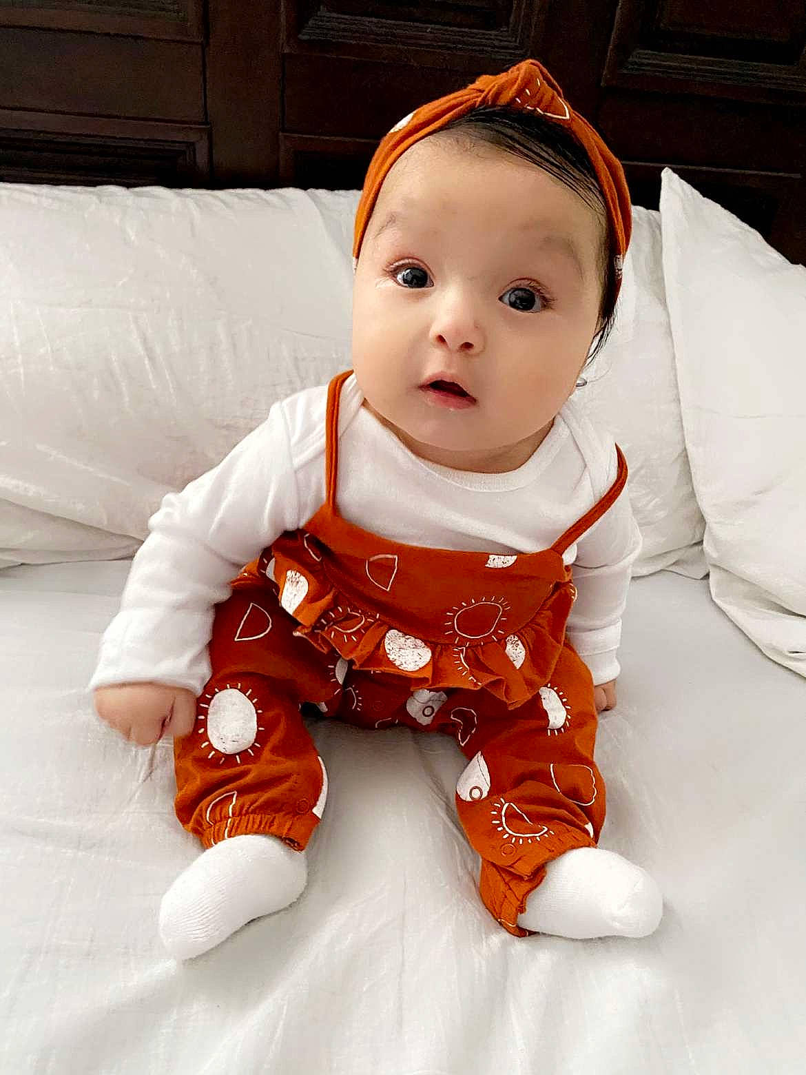 Zeinette joined the competition — help win amazing prizes! arm, baby, baby_toddler_clothing, cap, cheek, child, collar, comfort, couch, face, flooring, happy, pattern, peach, person, portrait_photography, sitting, sleeve, smile, surprise