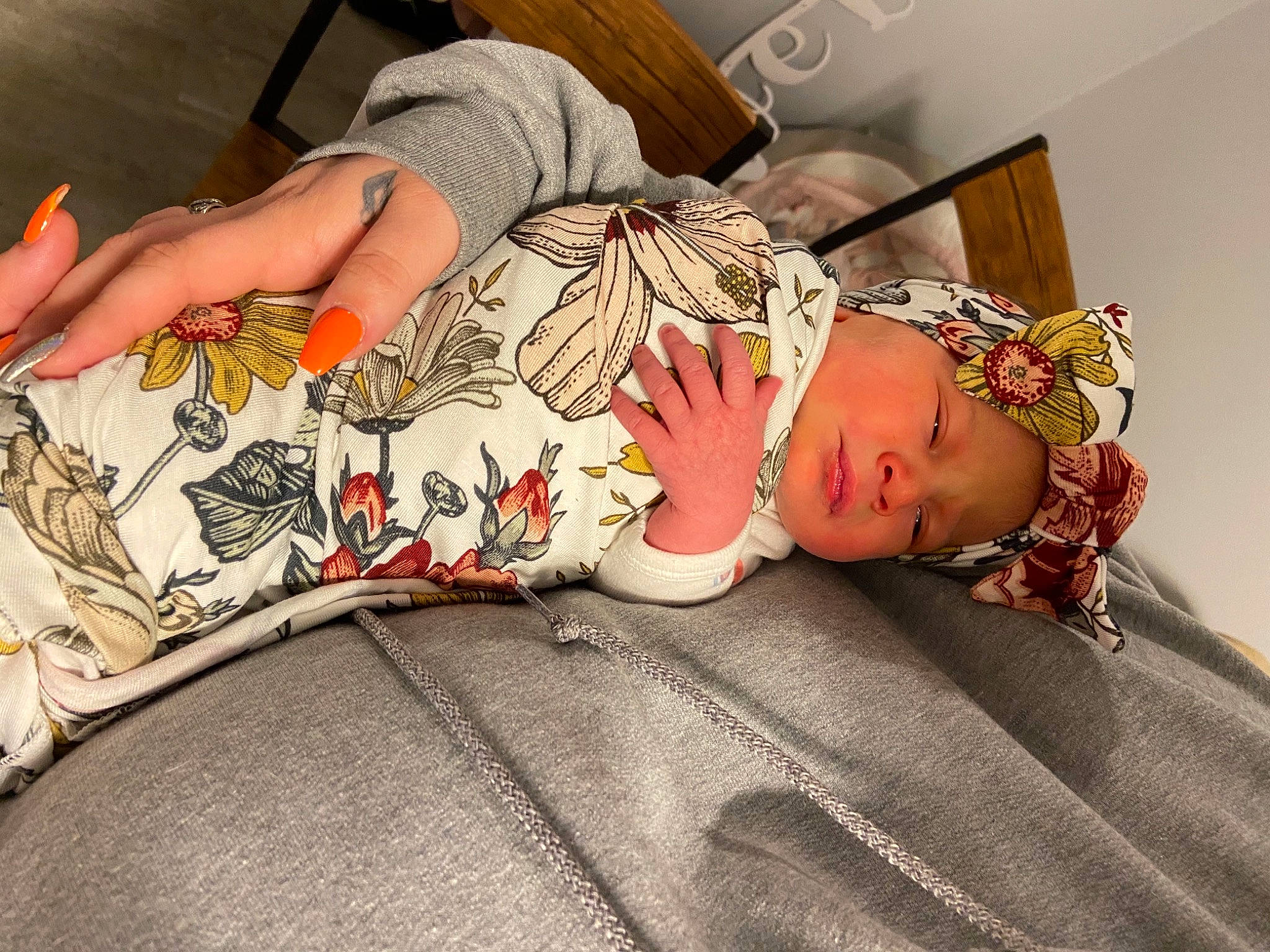 Addison joined the competition — help win amazing prizes! arm, art, baby, baby_toddler_clothing, bedding, child, comfort, couch, finger, hand, hat, headwear, human_leg, linens, mouth, pattern, person, room, tattoo, thigh