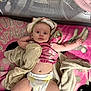 baby, diaper, blanket, pink, towel, cloth, infant, child, cute, laying, face, expression, soft, cozy, indoors, person, young, skin, headwear, comfort