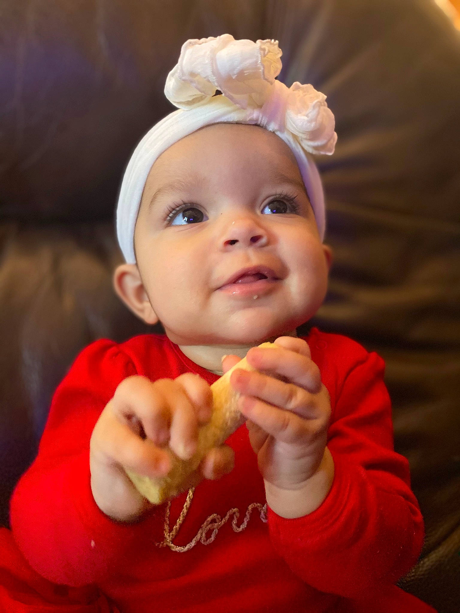 Ayva is registered to the contest to win money with this photo: baby, baby_toddler_clothing, cheek, child, child_model, costume_accessory, eye, finger, gesture, hair_accessory, hand, headband, headgear, headpiece, headwear, lip, person, portrait_photography, sleeve, taste