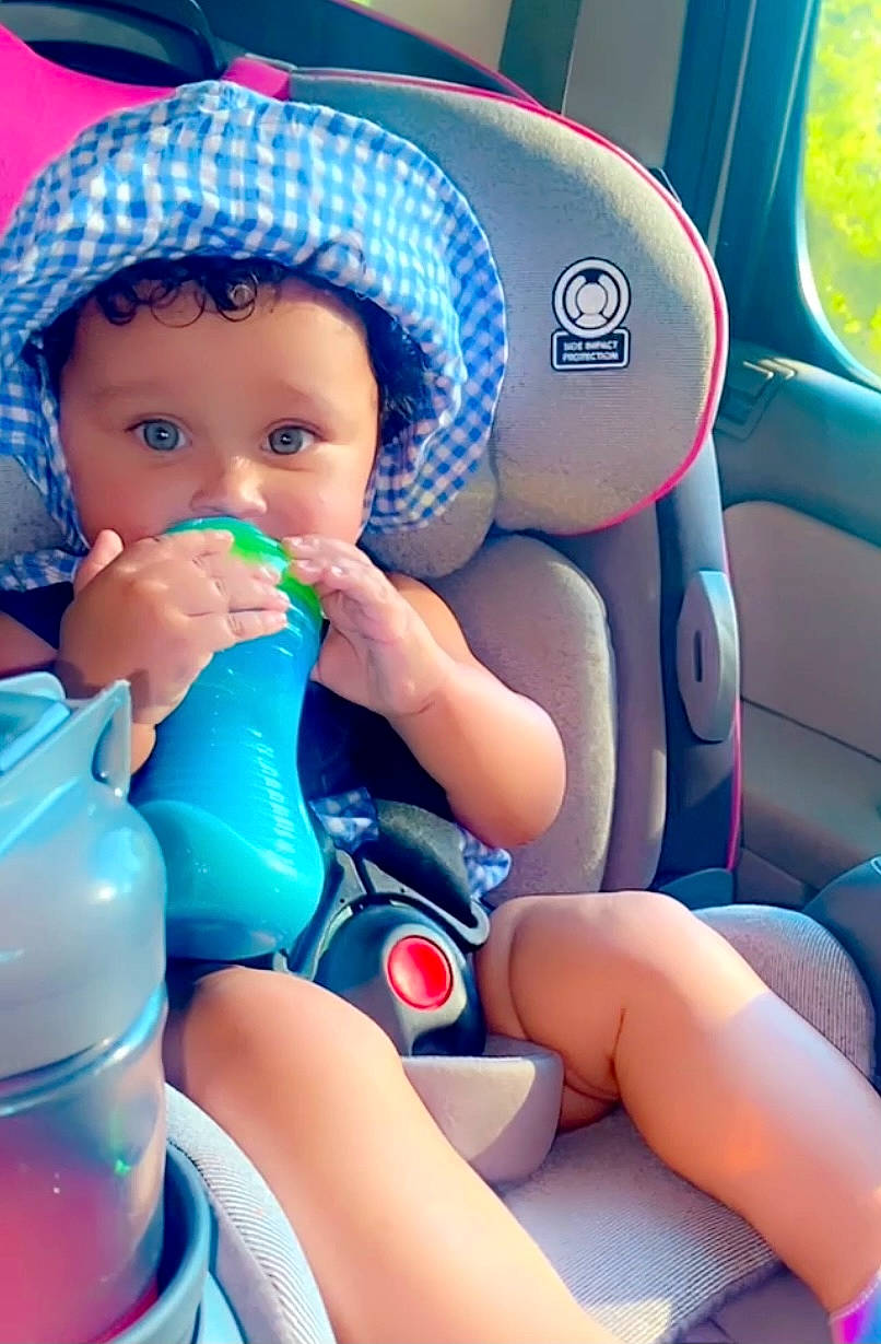 Wynter joined the competition — help win amazing prizes! azure, baby, baby_products, baby_toddler_clothing, blue, cap, car_seat_cover, comfort, electric_blue, finger, fun, happy, headwear, human_body, nail, person, plastic_bottle, skin, steering_wheel, thigh