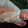 newborn, baby, sleeping, blanket, hat, infant, person, hand, hospital, bed, resting, peaceful, soft, cozy, closeup, portrait, wrapped, skin, cuddle, quiet