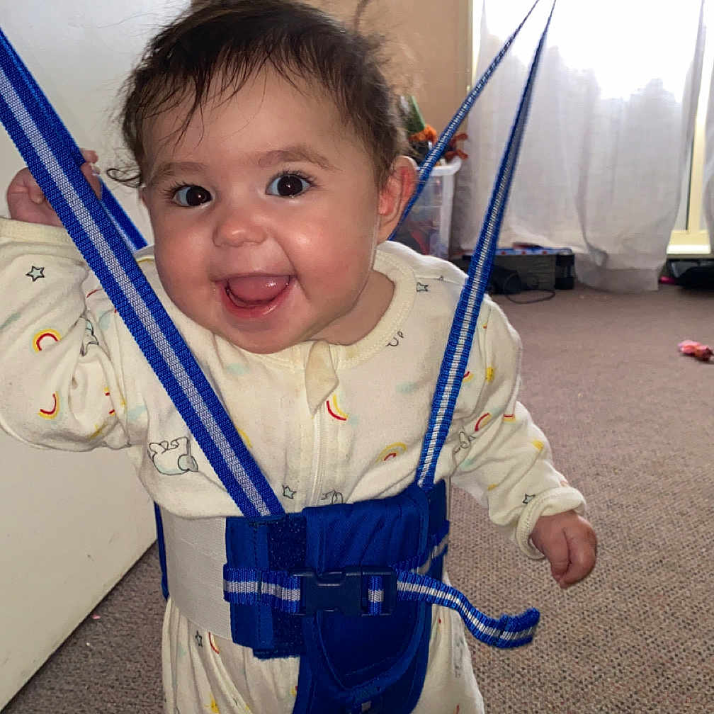 Mahalya is registered to the contest to win money with this photo: accessories, adventure, baby, bodypart, bungee, clothing, face, finger, hand, harness, head, leisureactivities, outdoors, pants, person, photography, playarea, portrait, strap, toy