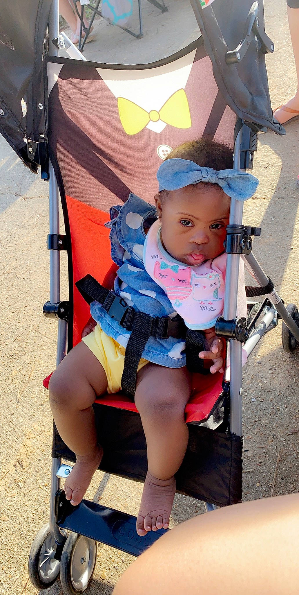 Tyler is registered to the contest to win money with this photo: auto_part, baby, baby_carriage, baby_products, child, leg, person, product, sitting, toddler, vacation