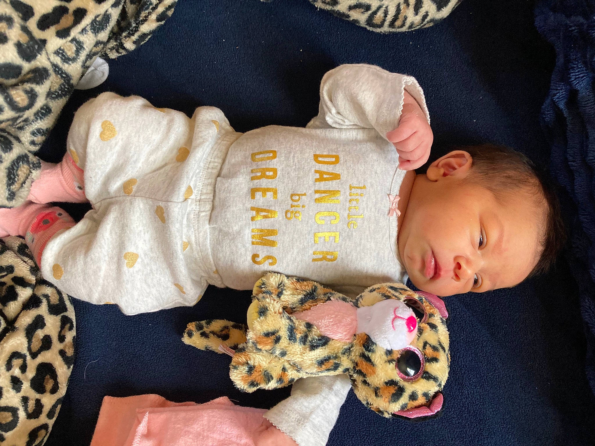 Gabriela is registered to the contest to win money with this photo: baby, baby_products, baby_sleeping, baby_toddler_clothing, cheek, child, comfort, craft, creative_arts, head, linens, pattern, person, product, room, sitting, skin, sleeve, textile, toddler