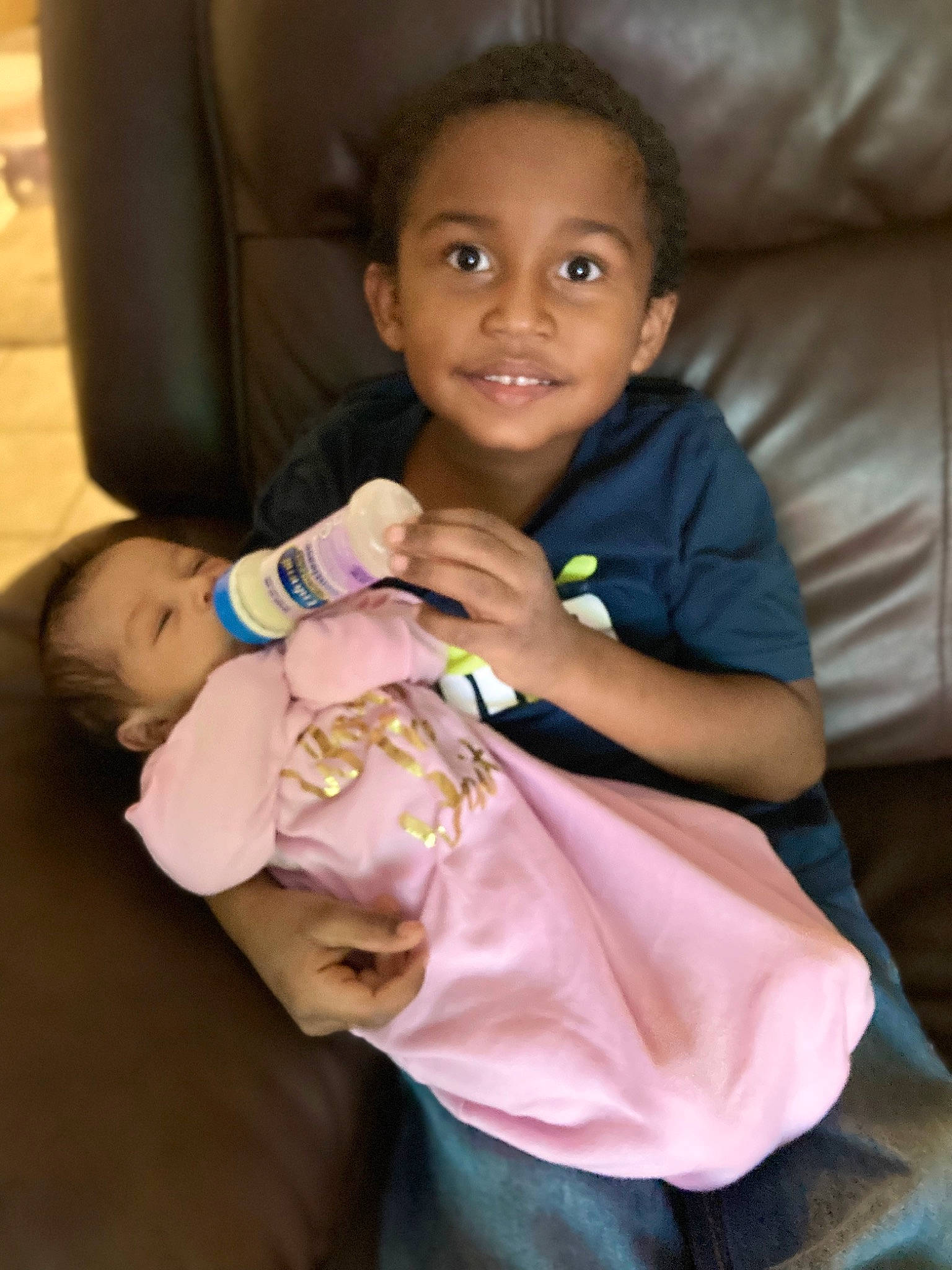 Julian is registered to the contest to win money with this photo: baby, baby_toddler_clothing, cheek, child, chin, comfort, eye, face, finger, fun, gesture, happy, head, iris, joy, mouth, nail, nose, person, skin